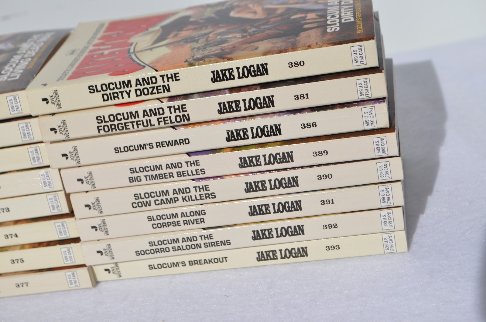 Lot of 24 John Slocum Westerns by Jake Logan-#361 to #393; March 2009-Nov. 2011