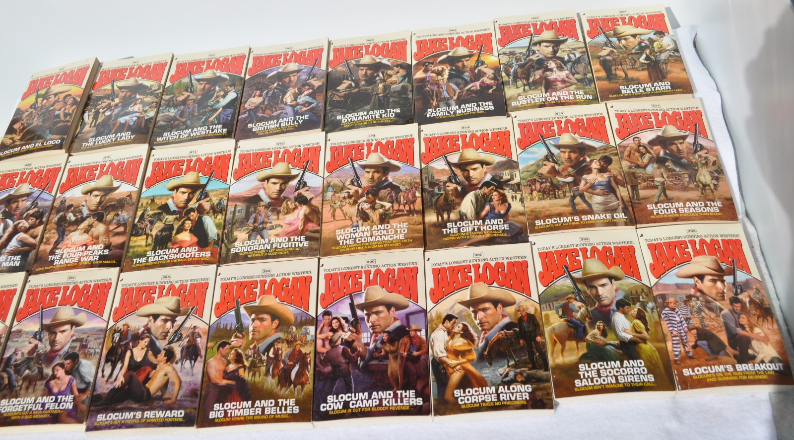 Lot of 24 John Slocum Westerns by Jake Logan-#361 to #393; March 2009-Nov. 2011