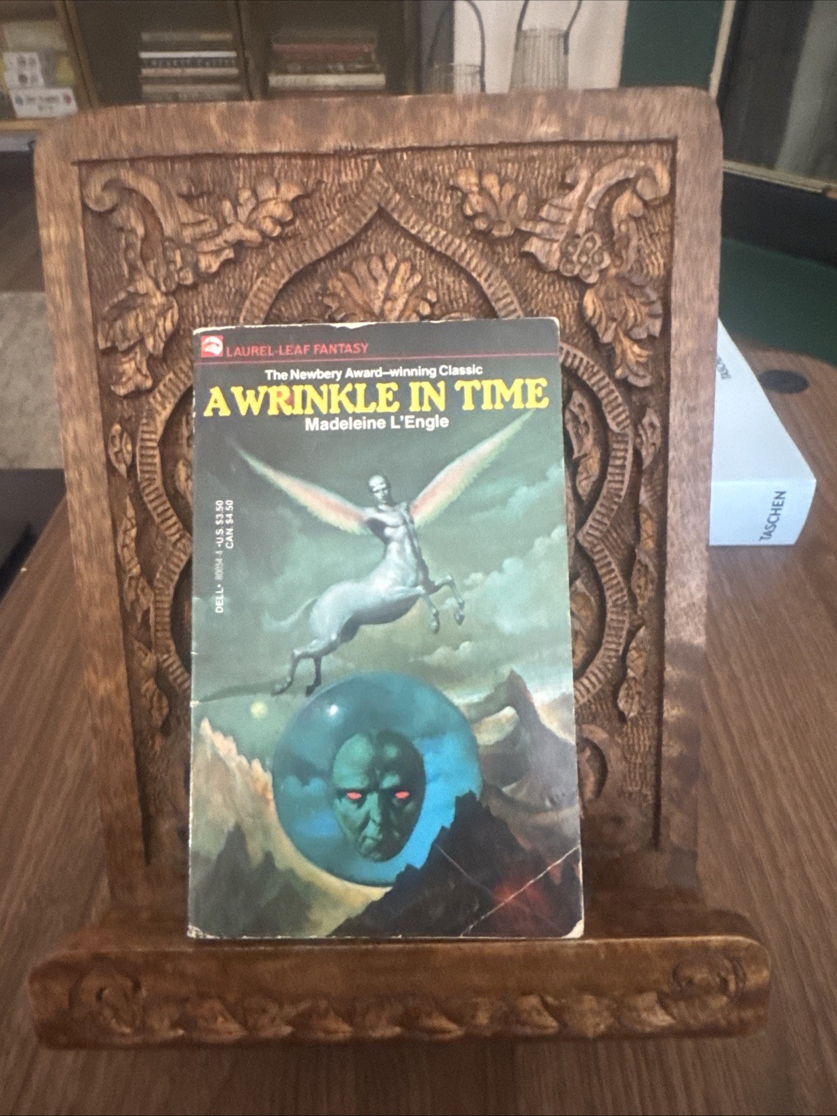A Wrinkle in Time • Madeleine L’Engle • 1976 Dell Laurel-Leaf • Science Fantasy