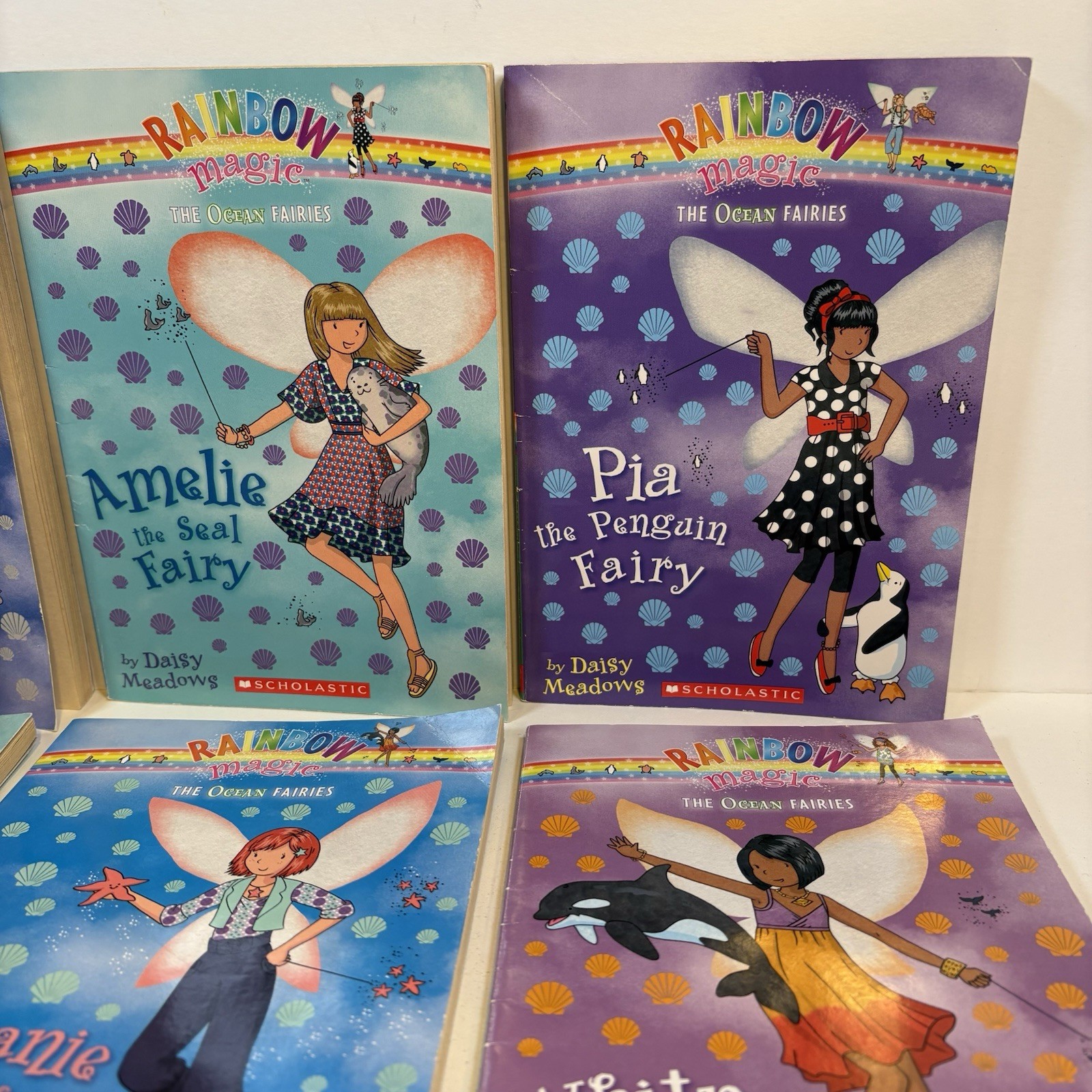THE OCEAN FAIRIES RAINBOW MAGIC FAIRIES: Books 1-7 Set/Lot (by Daisy Meadows)