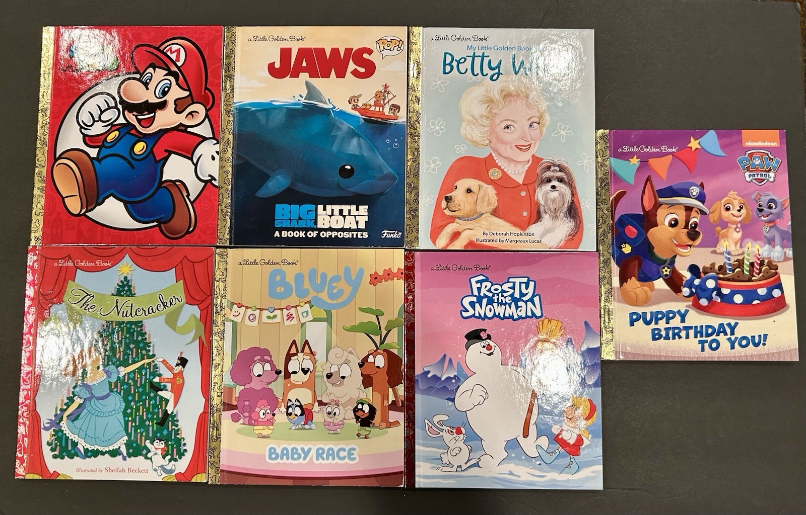 Golden Books (7 As Shown) Jaws, Super Mario, Betty White, Nutcracker, Bluey, Etc