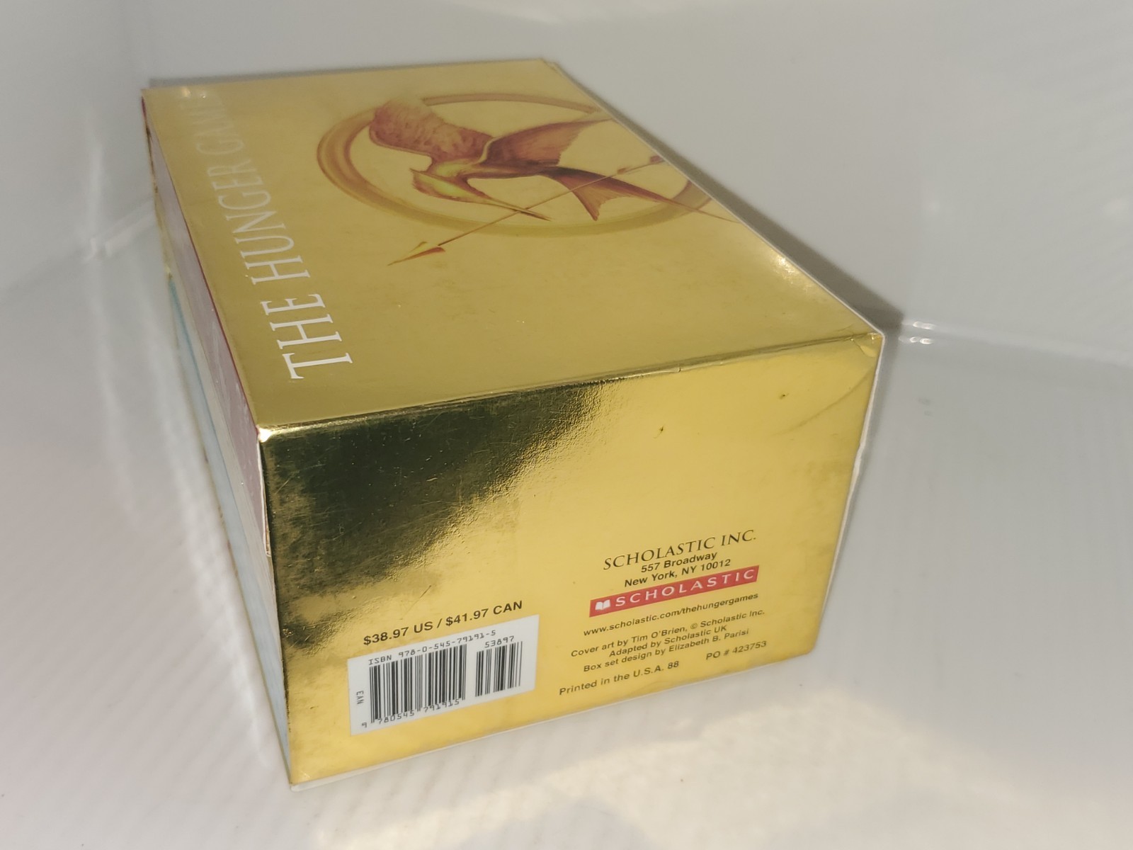The Hunger Games Box Set: Foil Edition, Paperback by Suzanne Collins.