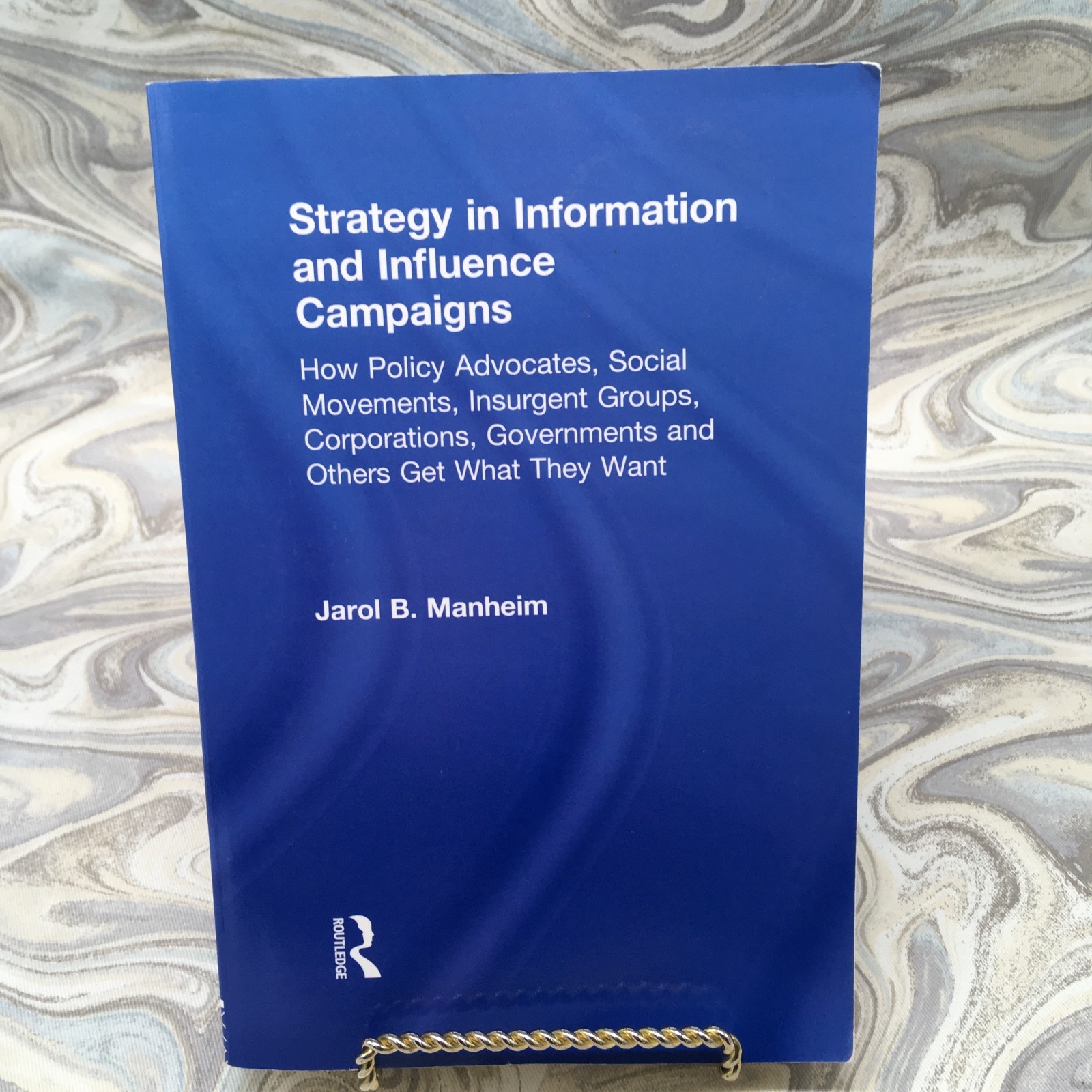 STRATEGY IN INFORMATION AND INFLUENCE CAMPAIGNS By Jarol B. Manheim Very Good