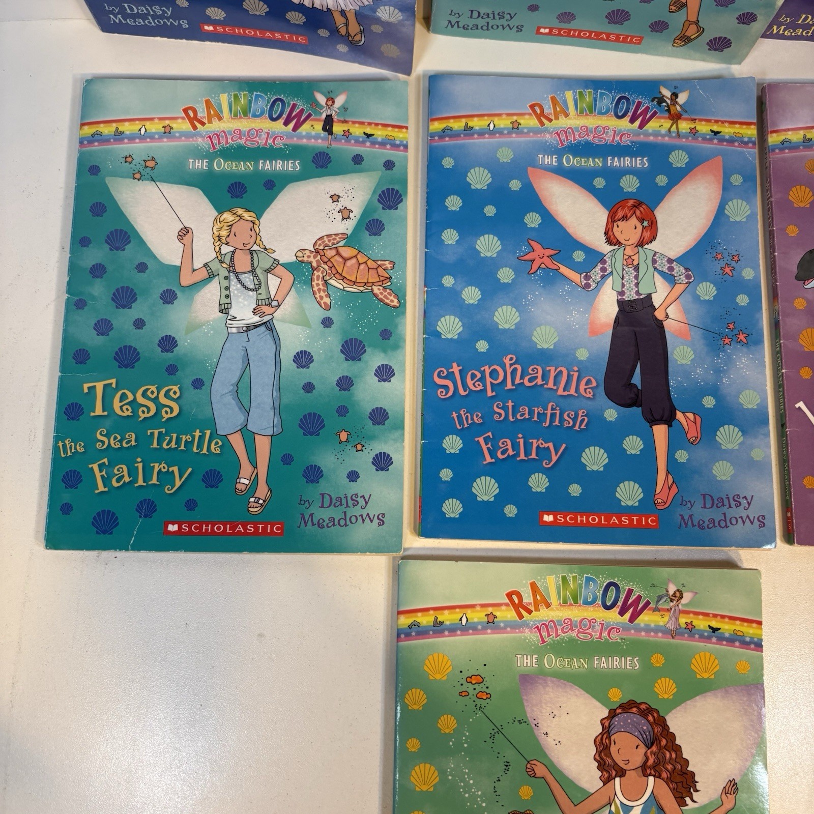 THE OCEAN FAIRIES RAINBOW MAGIC FAIRIES: Books 1-7 Set/Lot (by Daisy Meadows)