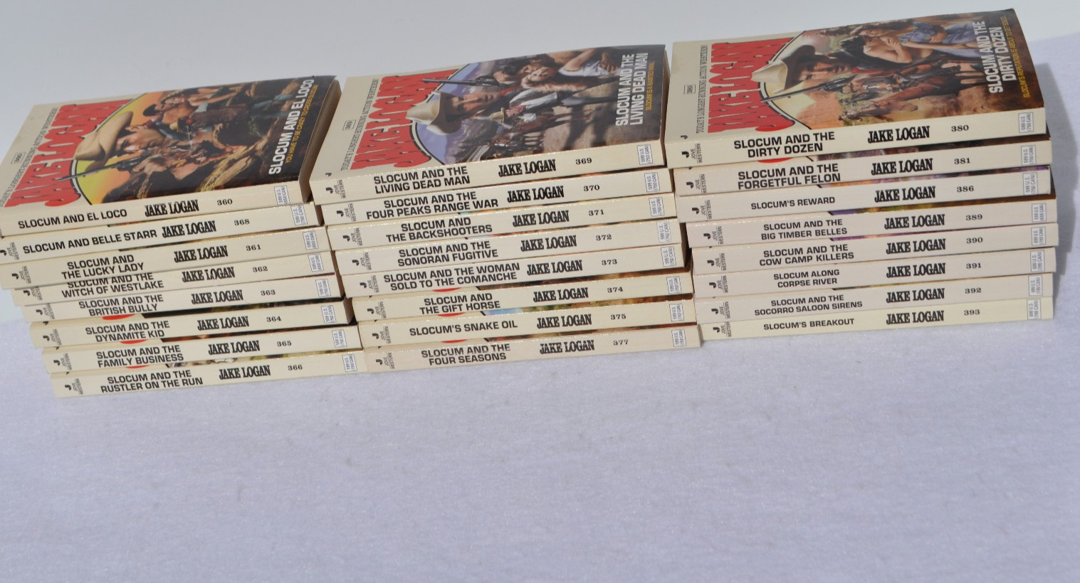 Lot of 24 John Slocum Westerns by Jake Logan-#361 to #393; March 2009-Nov. 2011