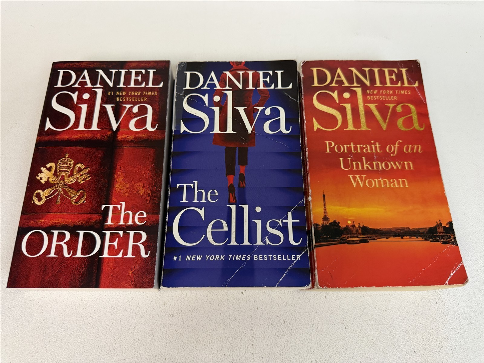Daniel Silva Lot 22 Paperbacks including 19 Gabriel Allon series