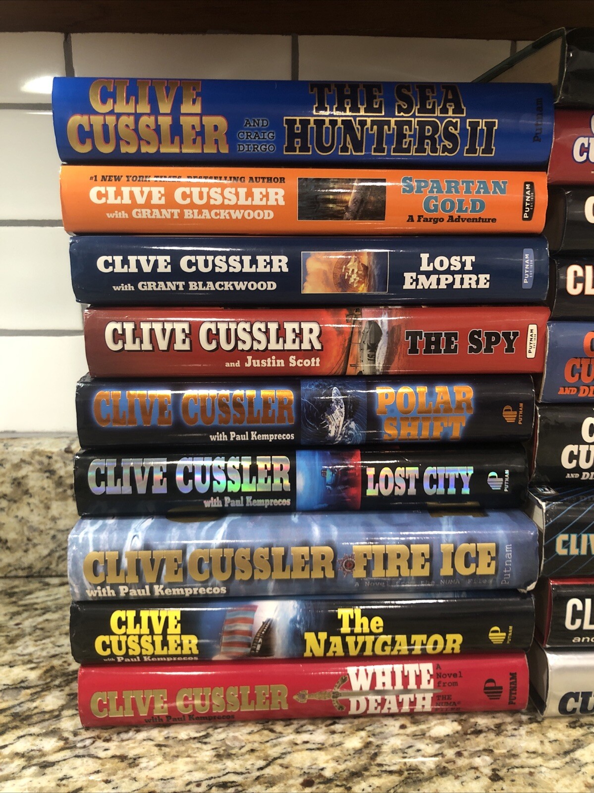Clive Cussler Hardcover Books Lot of 27 See Photos for Titles Excellent Conditio