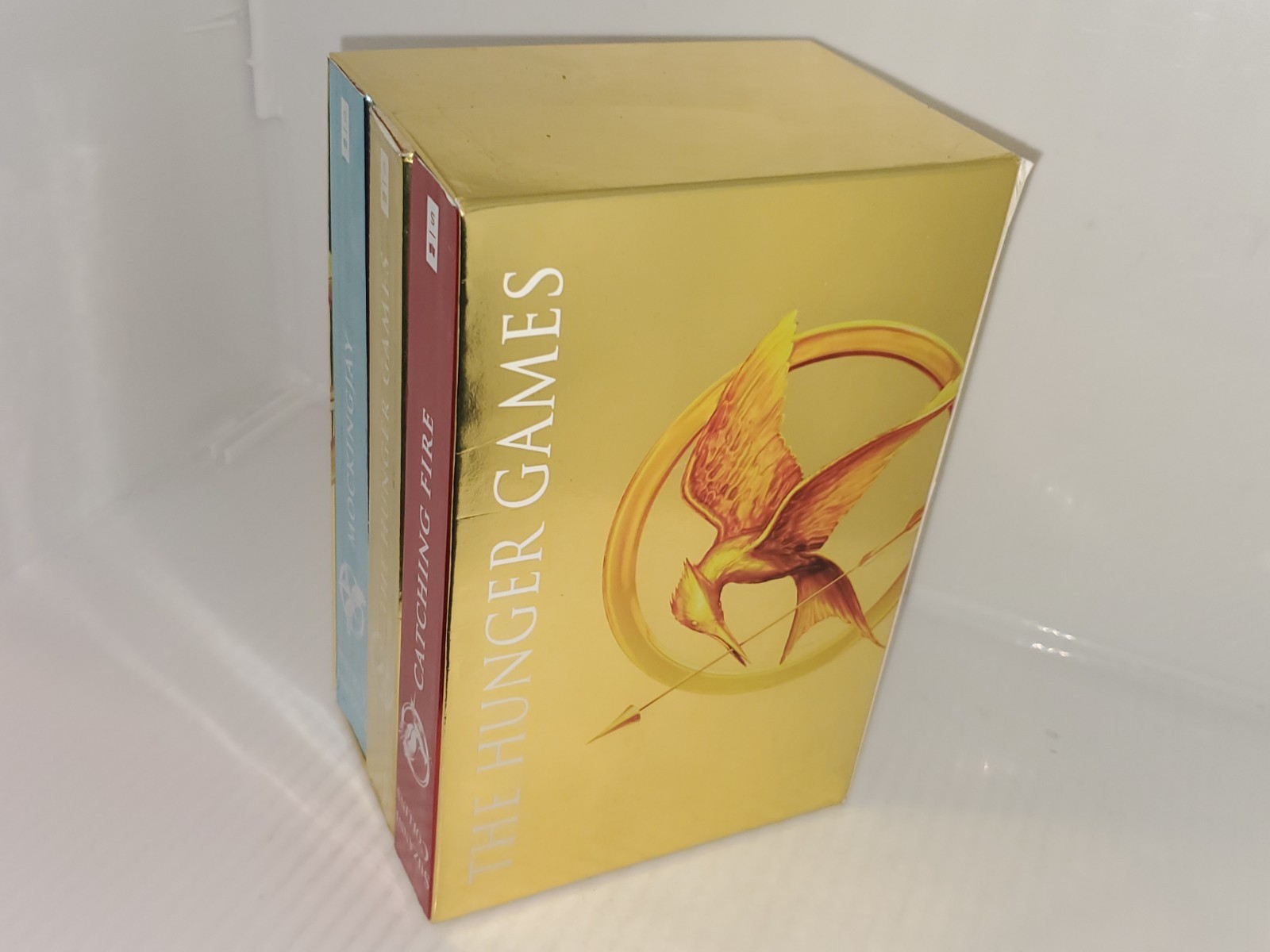 The Hunger Games Box Set: Foil Edition, Paperback by Suzanne Collins.