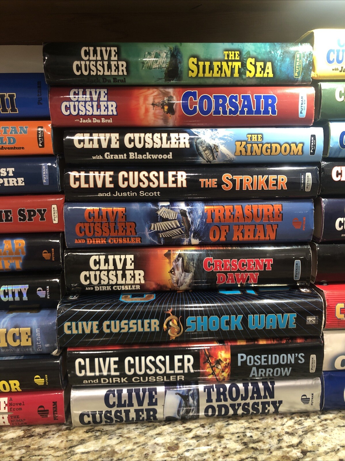 Clive Cussler Hardcover Books Lot of 27 See Photos for Titles Excellent Conditio