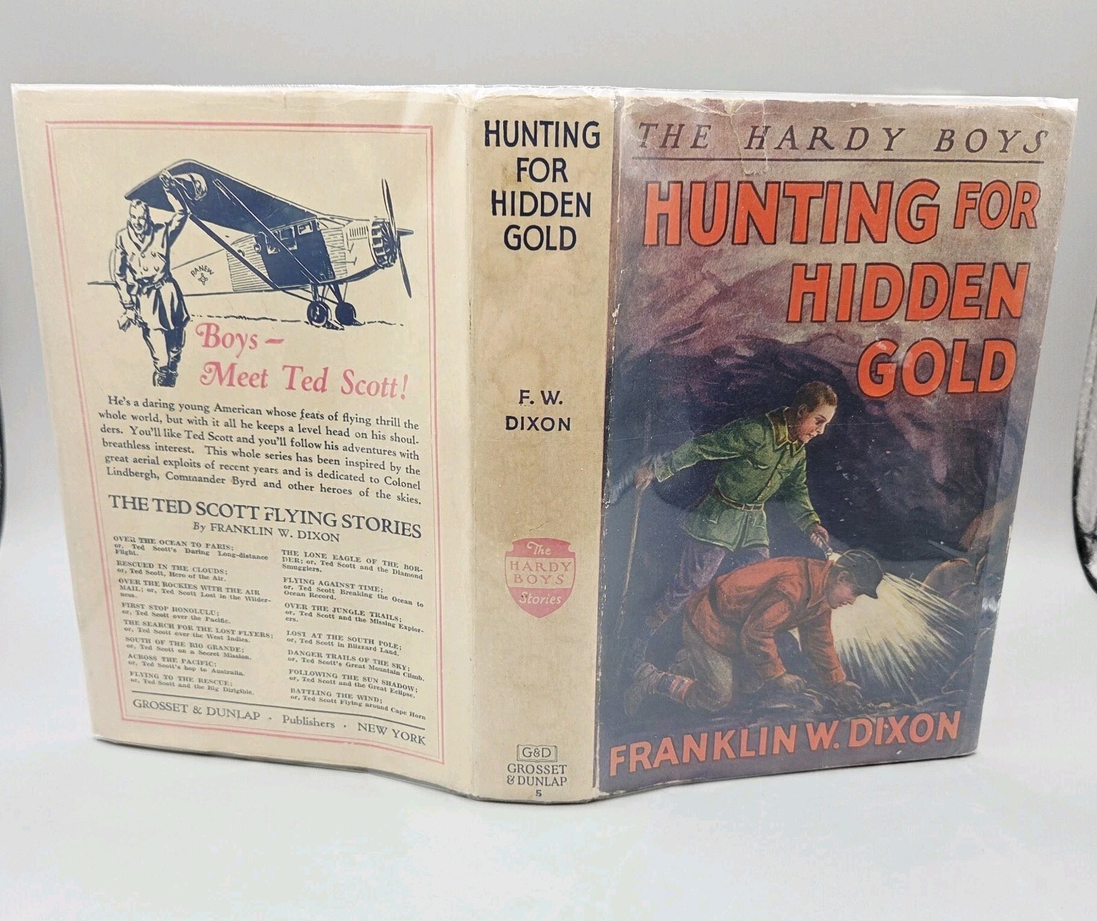 Hunting for Hidden Gold 1928 HCDJ Tan Cloth Early Cave‑Art Jacket Variant
