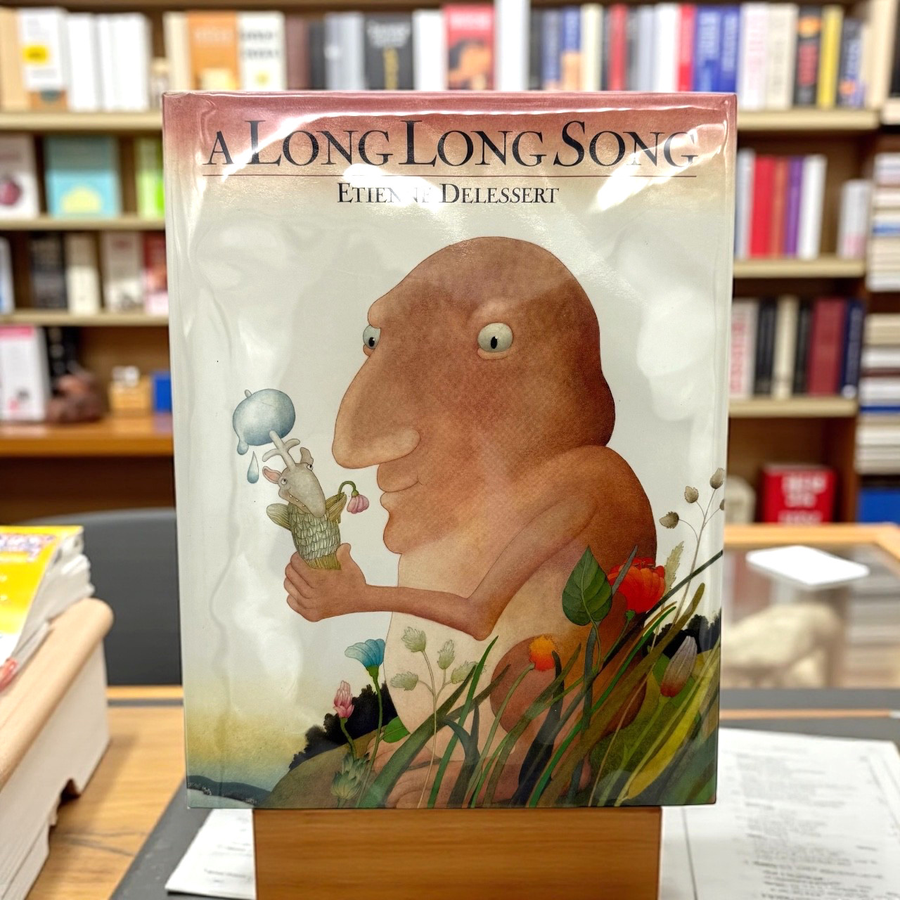 A LONG LONG SONG By Etienne Delessert – 1st ED Hardcover Near fine / very good +