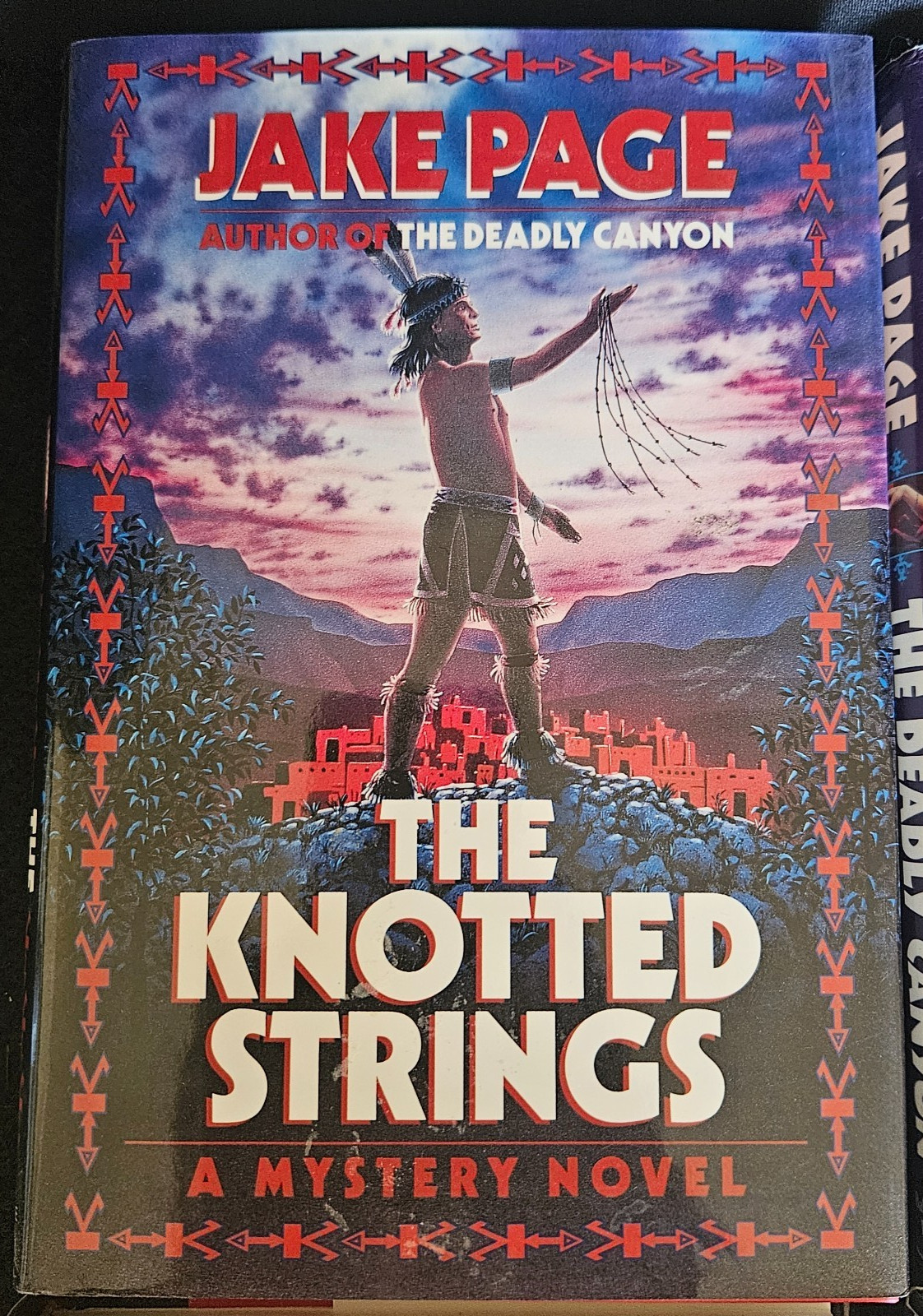4 HC Jake Page Novels. 1 Knotted Strings is Autographed 1st Printing. All VG!