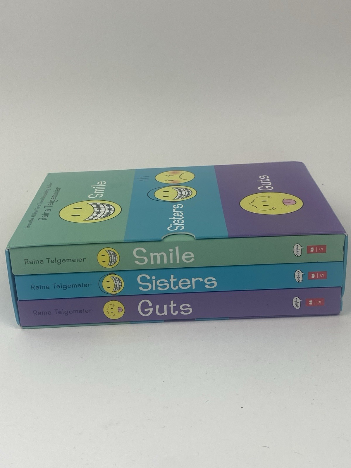 Smile, Sisters, and Guts: the Box Set by Raina Telgemeier