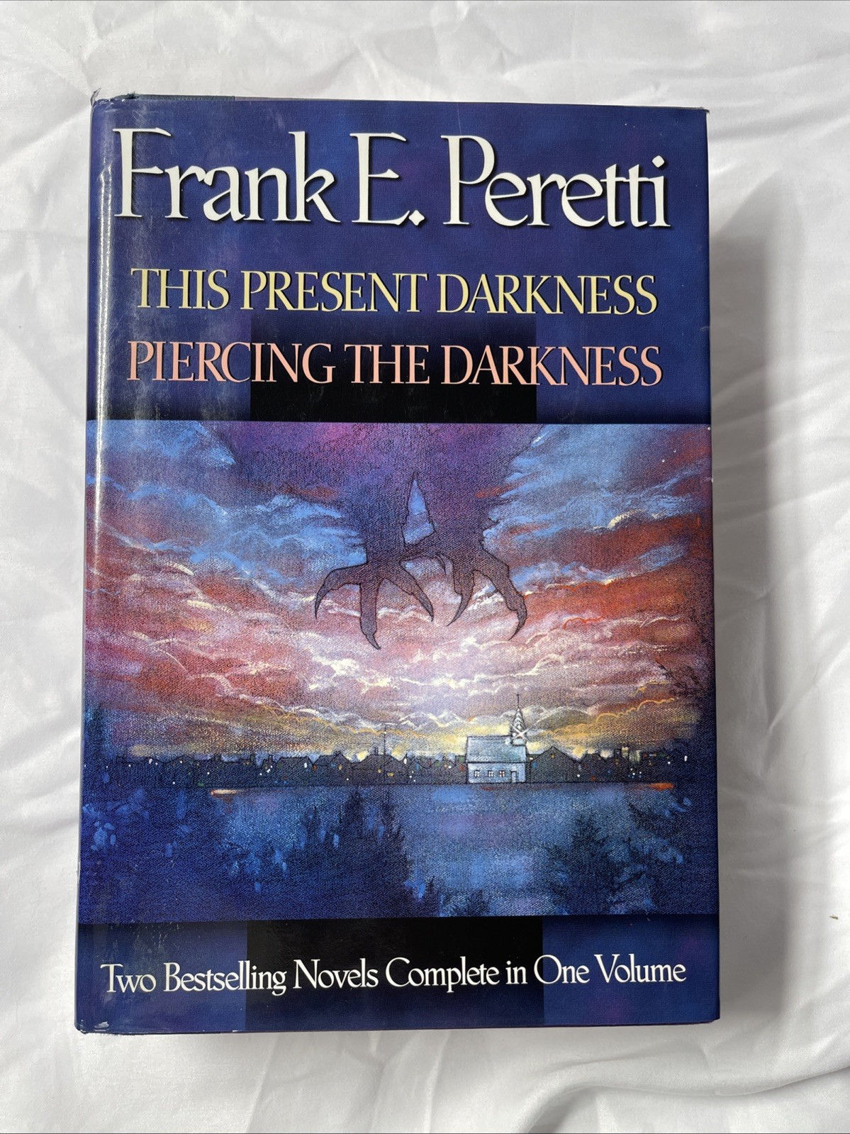 Frank Peretti 2-in-1: This Present Darkness & Piercing the Darkness Hardcover