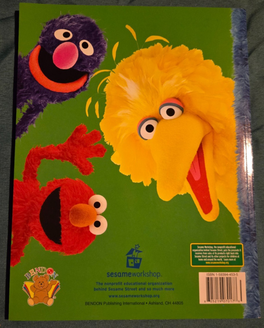 Rare 2004 Elmo Sesame street animals around the world coloring activity book New