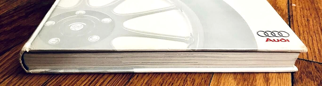 A HISTORY OF PROGRESS—CHRONICLE OF AUDI AG (1996) HARDCOVER—276 PAGES—EXCELLENT