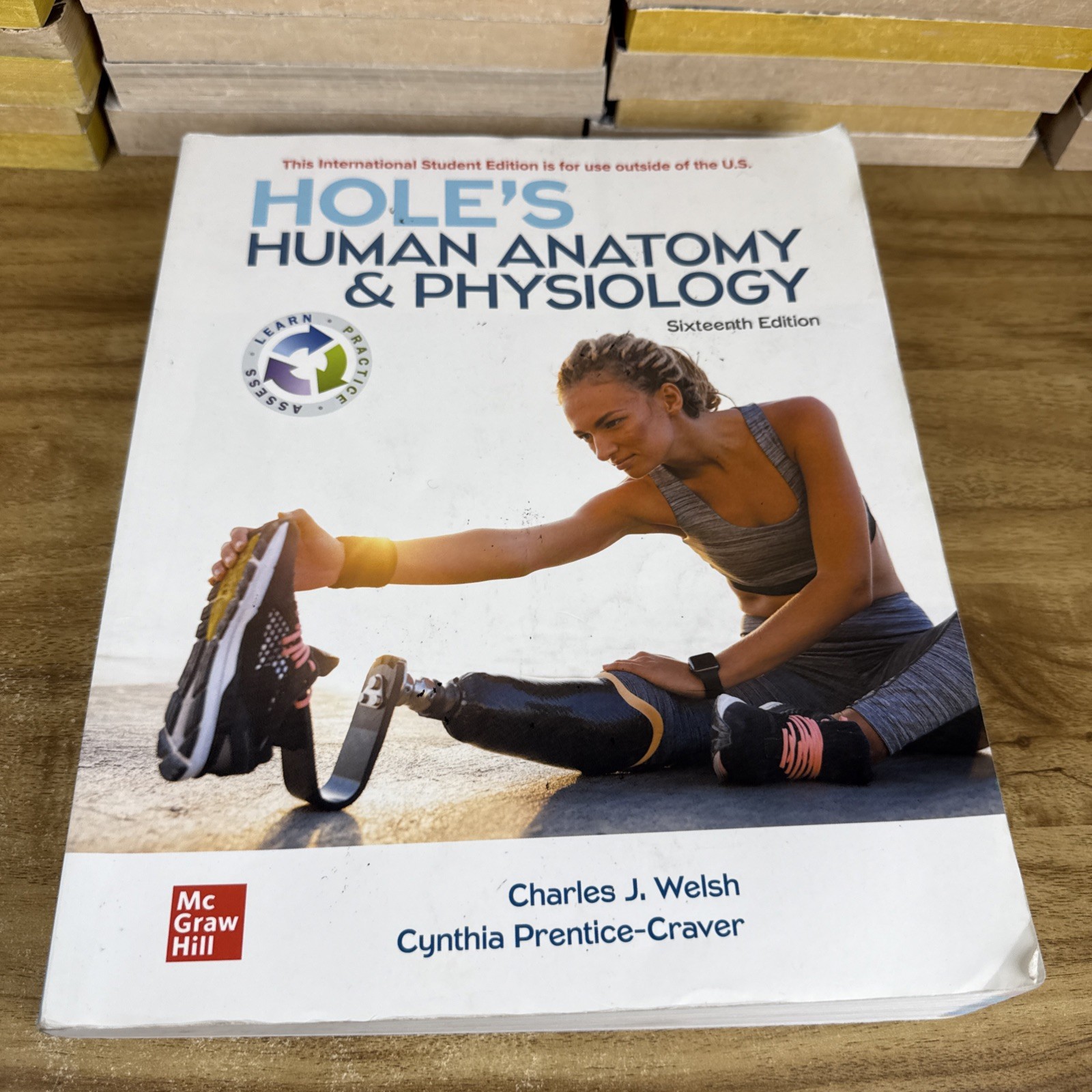 ISE Hole’s Human Anatomy & Physiology 16th Edition Paperback Acceptable