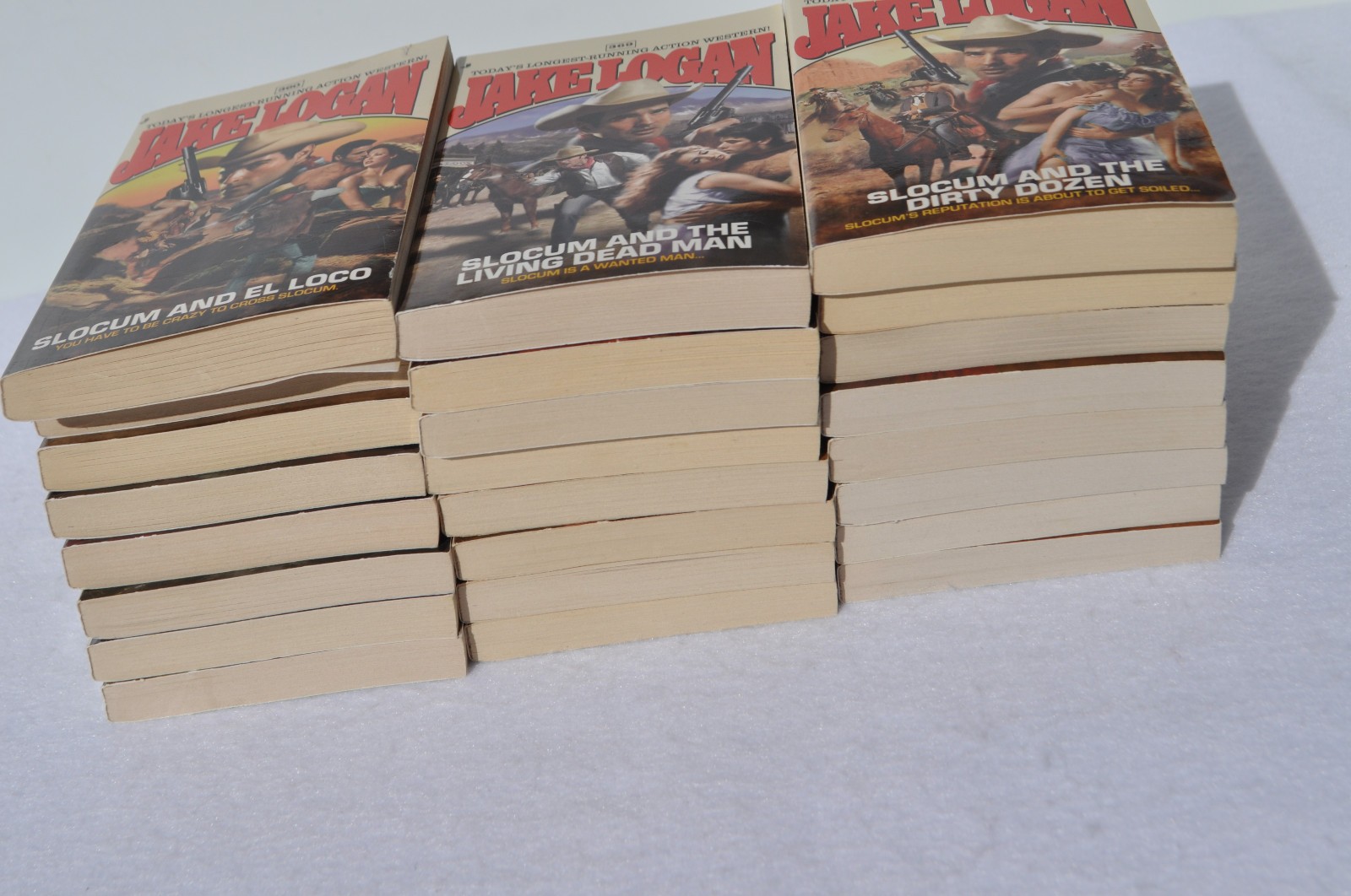 Lot of 24 John Slocum Westerns by Jake Logan-#361 to #393; March 2009-Nov. 2011