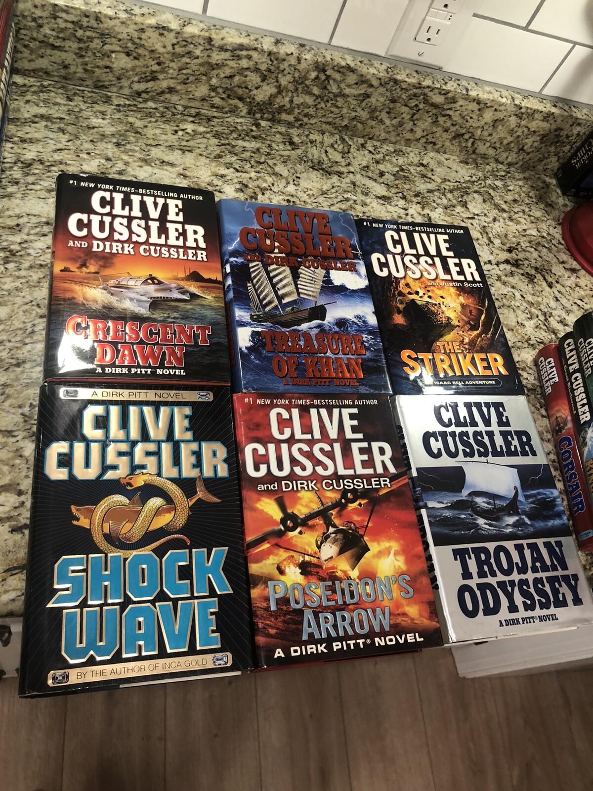 Clive Cussler Hardcover Books Lot of 27 See Photos for Titles Excellent Conditio