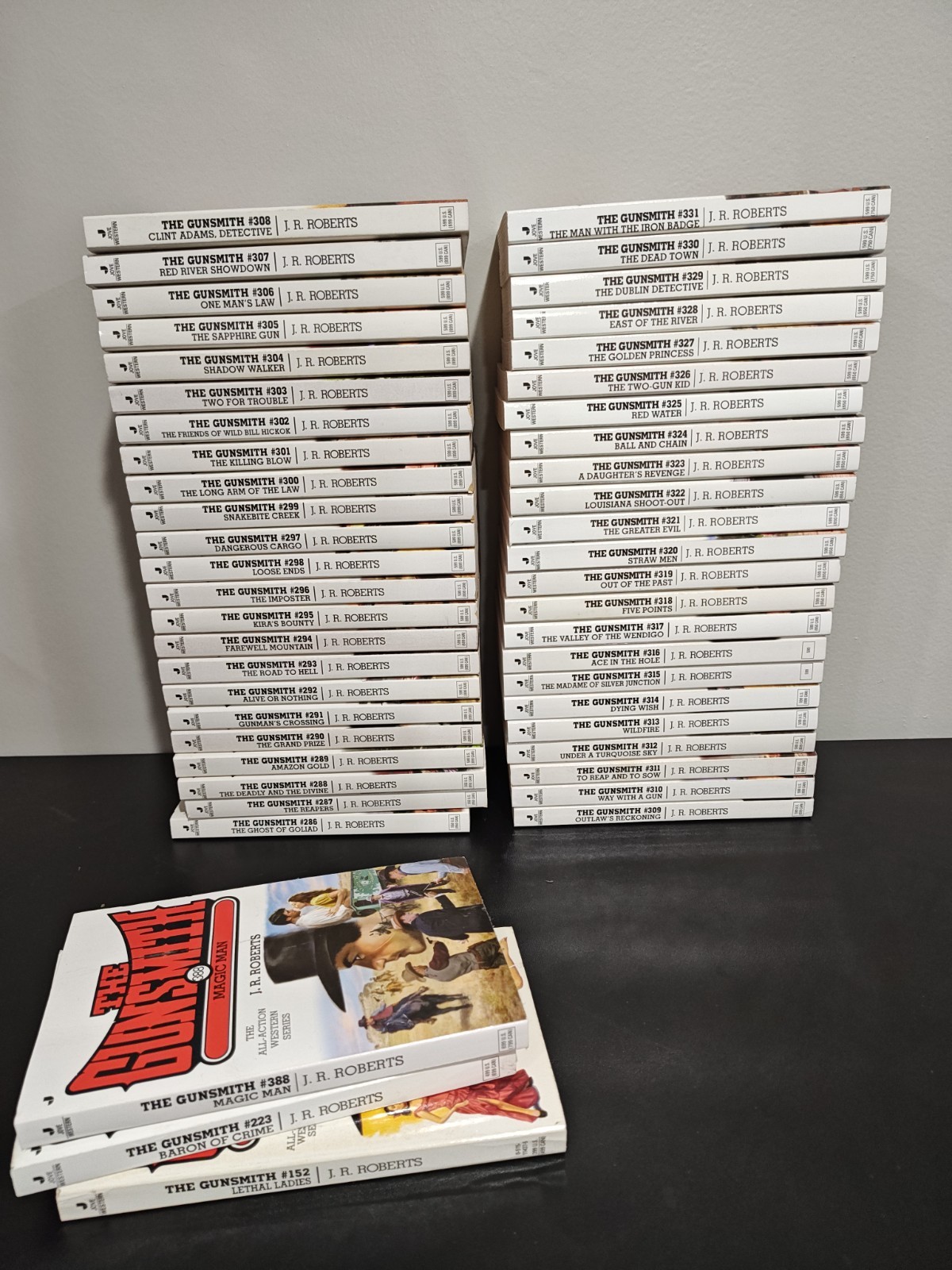 Lot of 50 Vintage The Gunsmith Paperback Books by J. R. Roberts Romance Novel