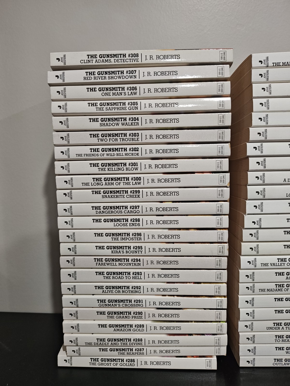 Lot of 50 Vintage The Gunsmith Paperback Books by J. R. Roberts Romance Novel