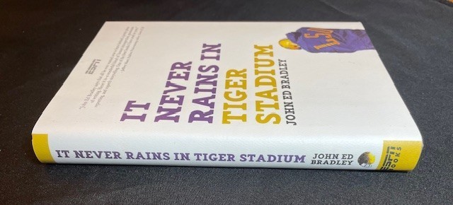 IT NEVER RAINS IN TIGER STADIUM – John Ed Bradley (Signed/First Edition)