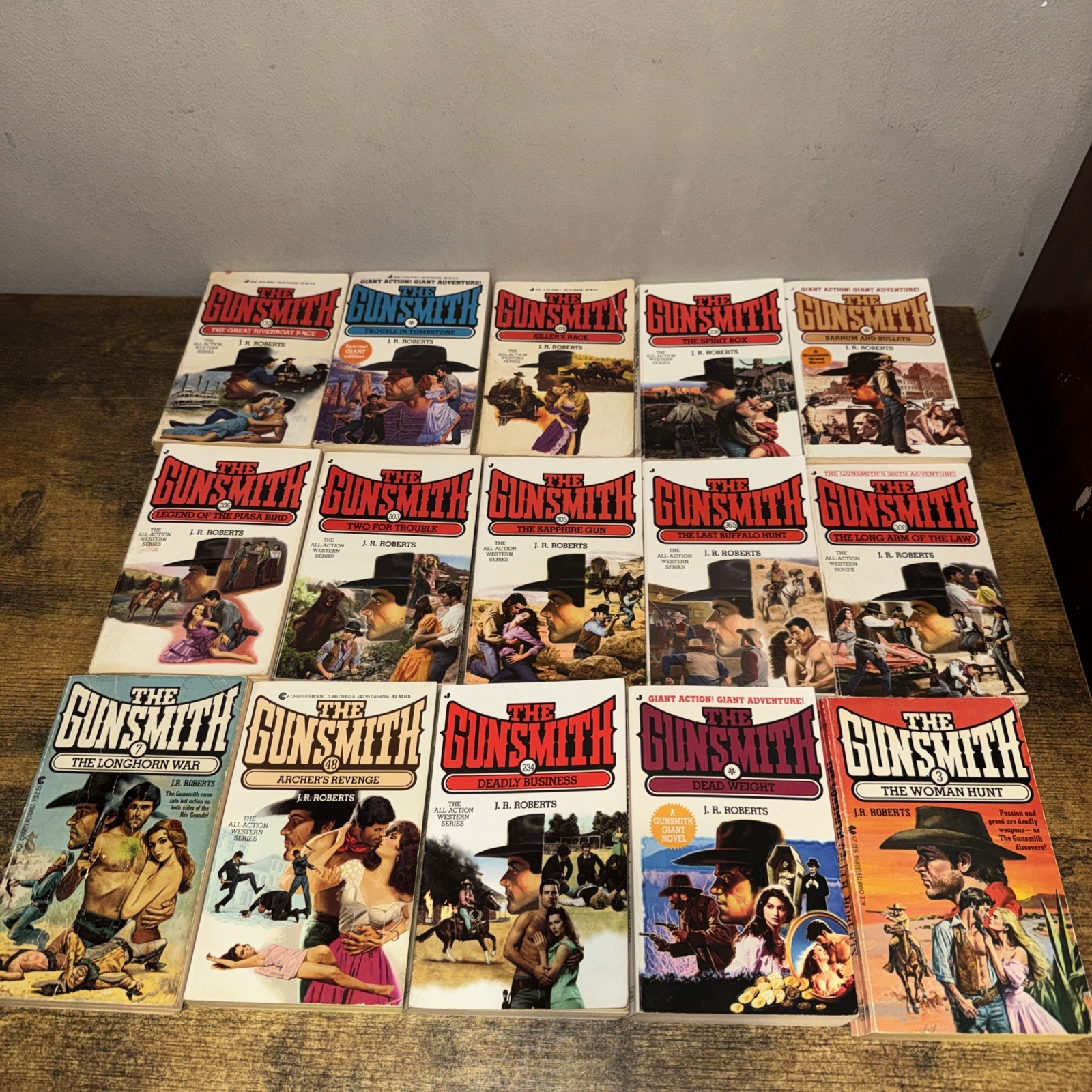 J.R. Roberts lot 15 Western paperback books Gunsmith Series 3 are Giant Editions