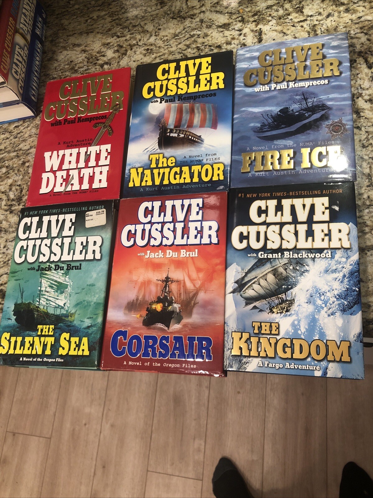 Clive Cussler Hardcover Books Lot of 27 See Photos for Titles Excellent Conditio
