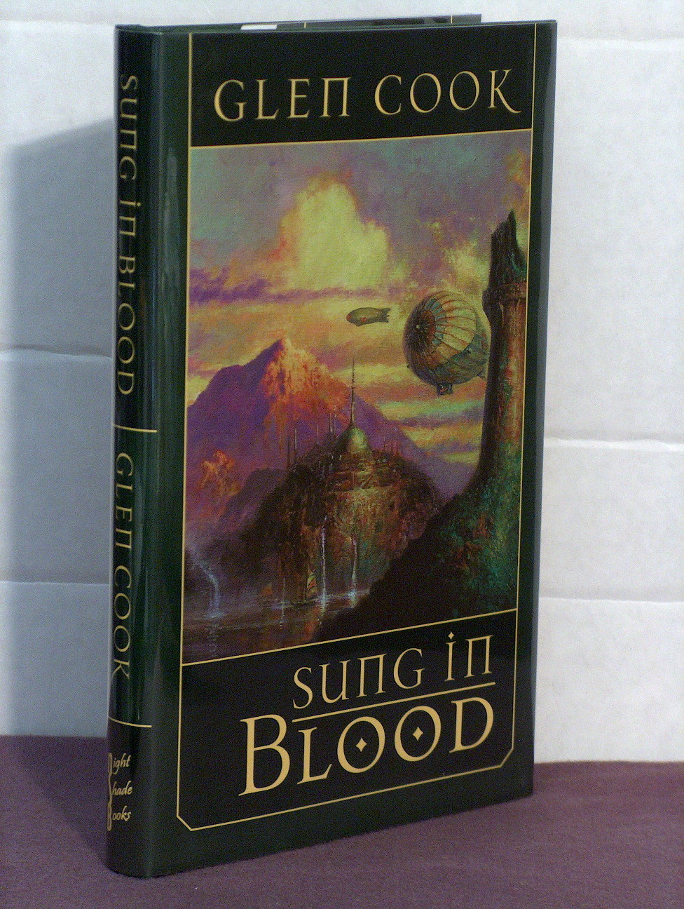 signed by 2(author,artist), Sung in Blood by Glen Cook (2006)art by Bob Eggleton