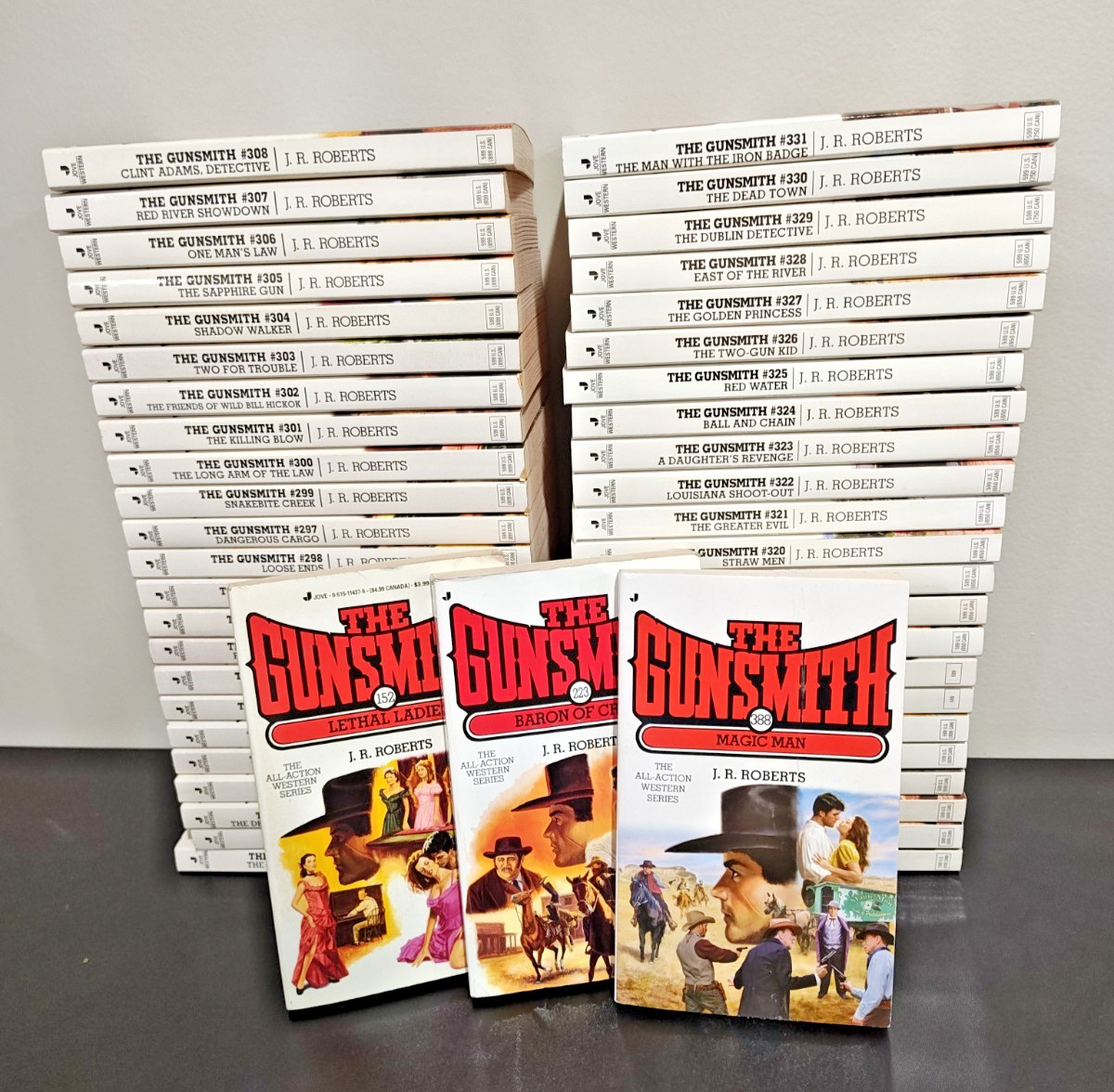 Lot of 50 Vintage The Gunsmith Paperback Books by J. R. Roberts Romance Novel