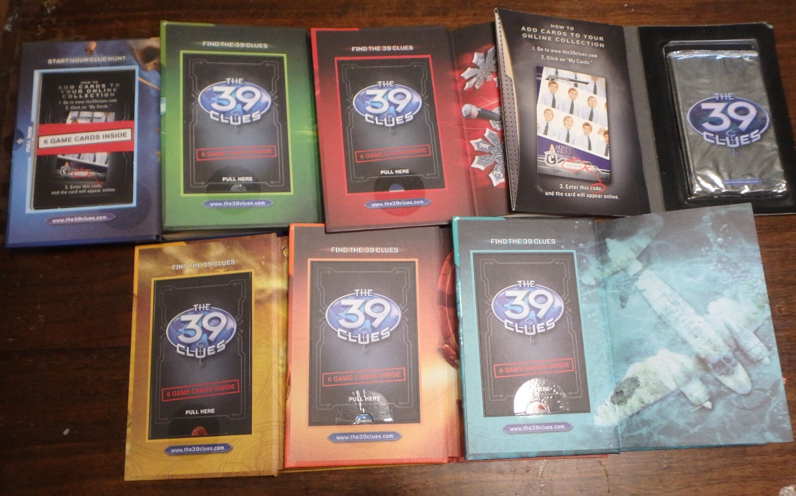 39 Clues Books 1-6, 1 unopened card pack for 1-3 BKST14