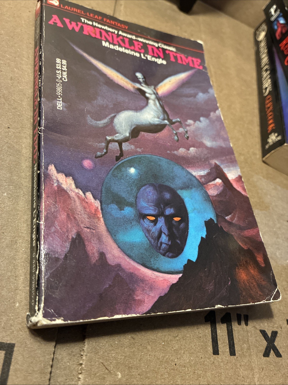 A Wrinkle in Time by Madeleine L’Engle (Paperback, 1976)Dell Laurel Leaf Fantasy