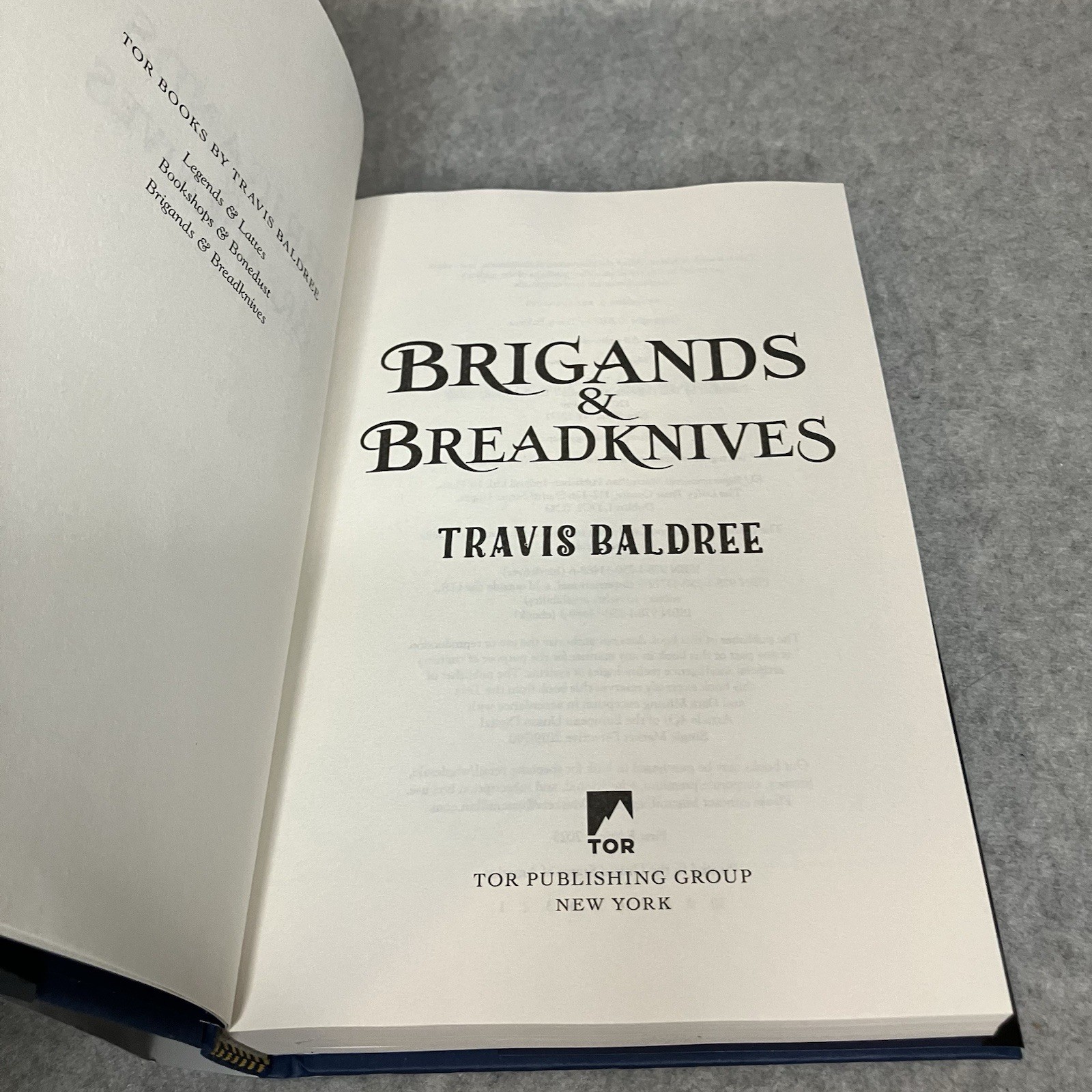Brigands and Breadknives Travis Baldree 2025 Hardcover Signed 1st Ed w/Sticker