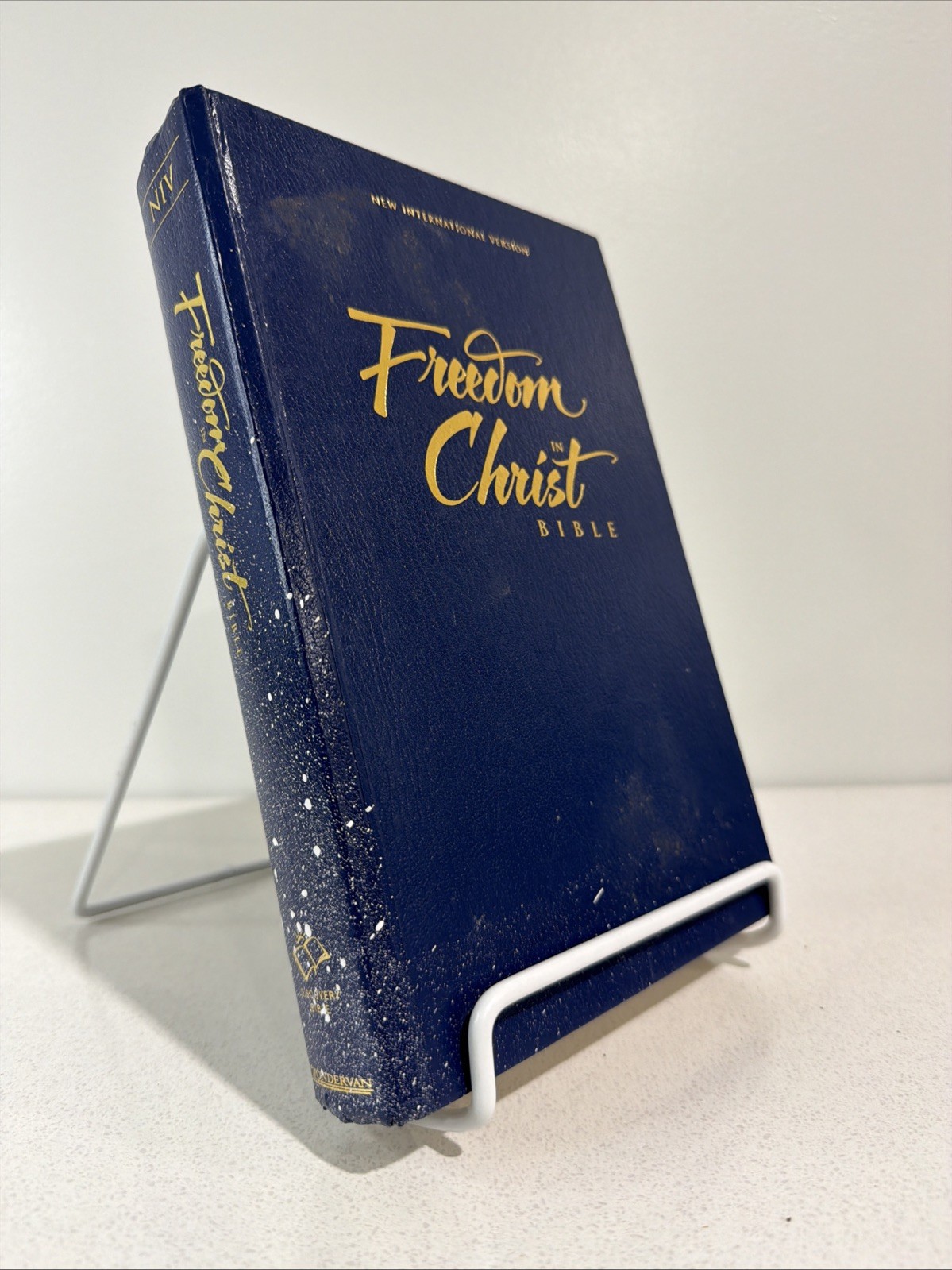 Freedom in Christ Bible by Zondervan Staff Blue 2001 Paint Splatter On Book