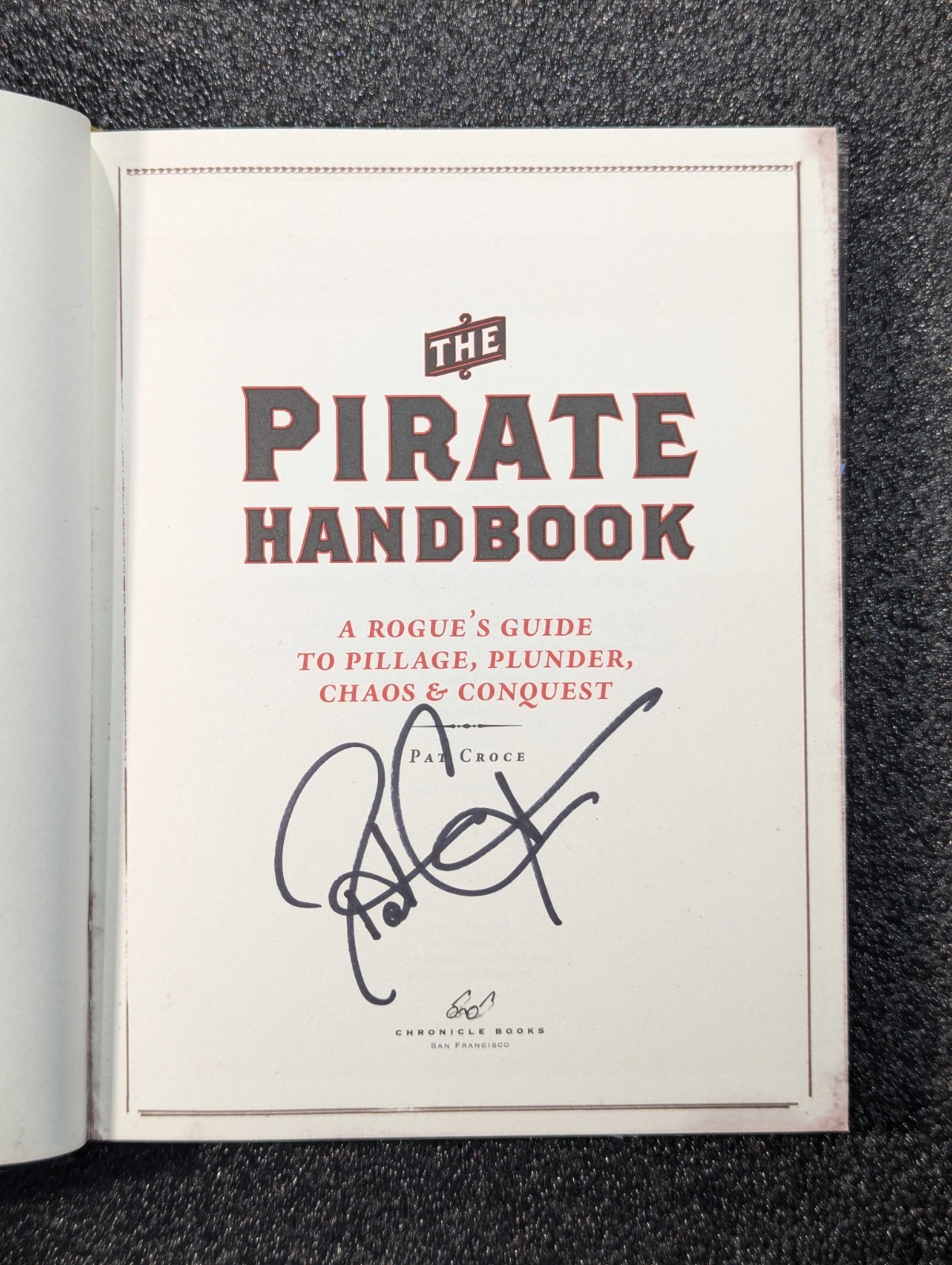 Pirate Handbook: A Rogue’s Guide to Pillage, Plunder, Chaos & Conquest (signed)