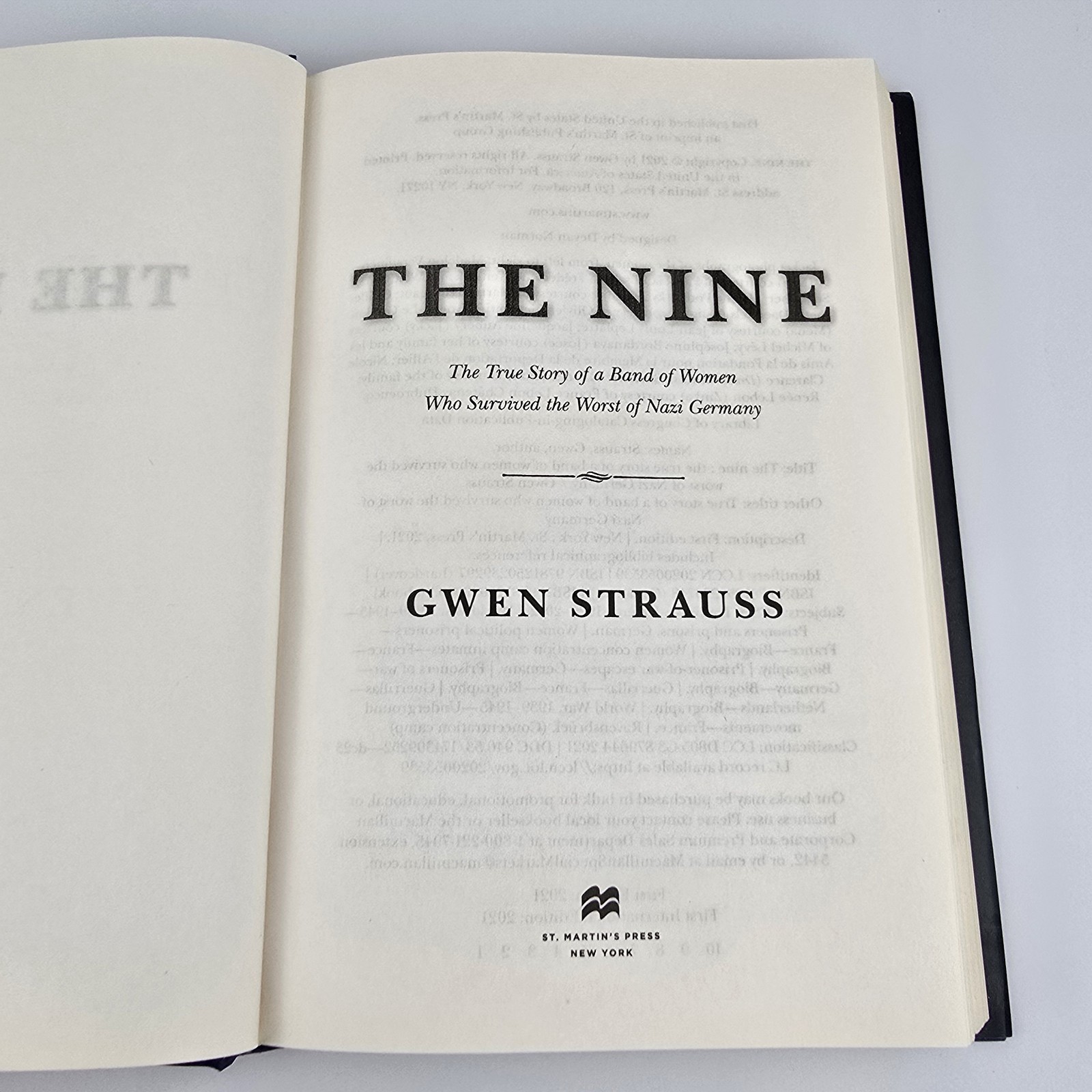 The Nine by Gwen Strauss Hardcover Book