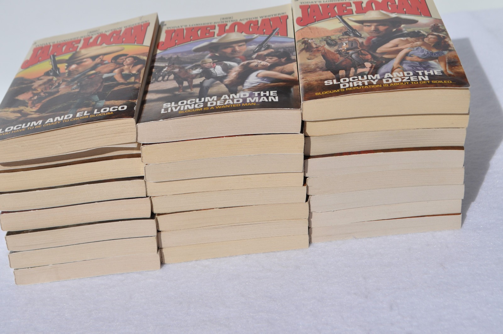 Lot of 24 John Slocum Westerns by Jake Logan-#361 to #393; March 2009-Nov. 2011