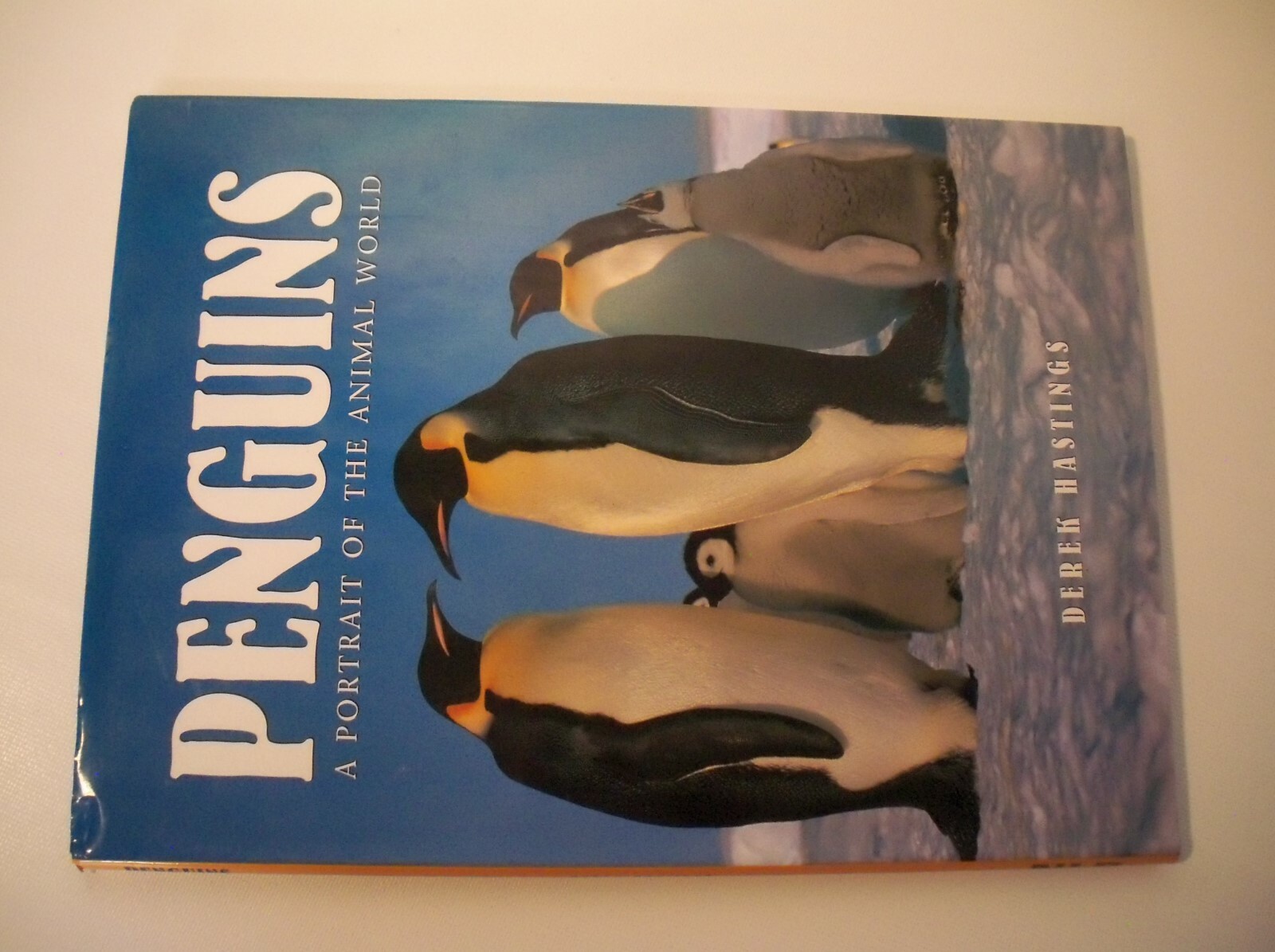 Penguins Hardback Book by Derek Hastings
