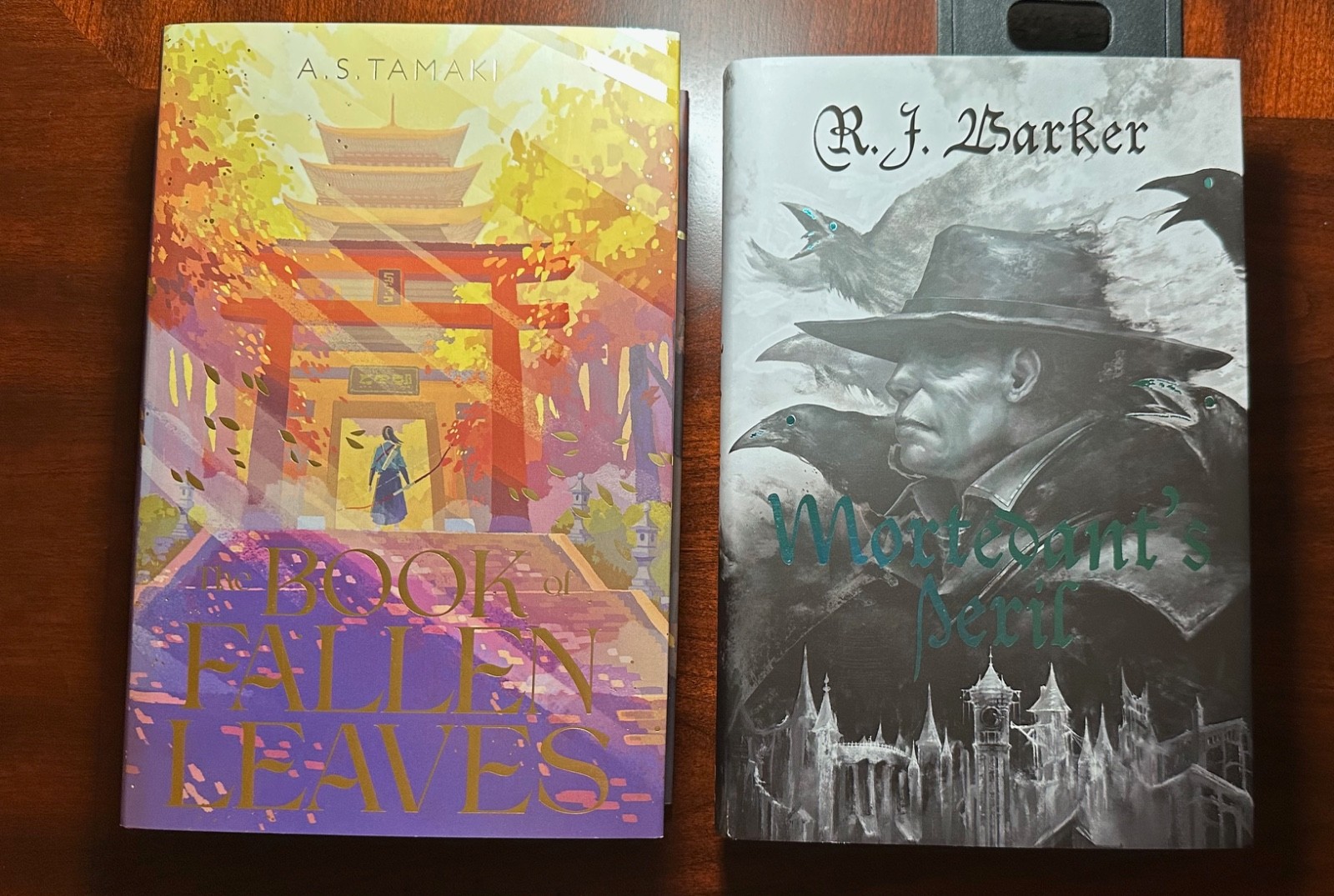 FairyLoot: Book of Fallen Leaves by AS Tamaki & Mortedant’s Peril by RJ Barker