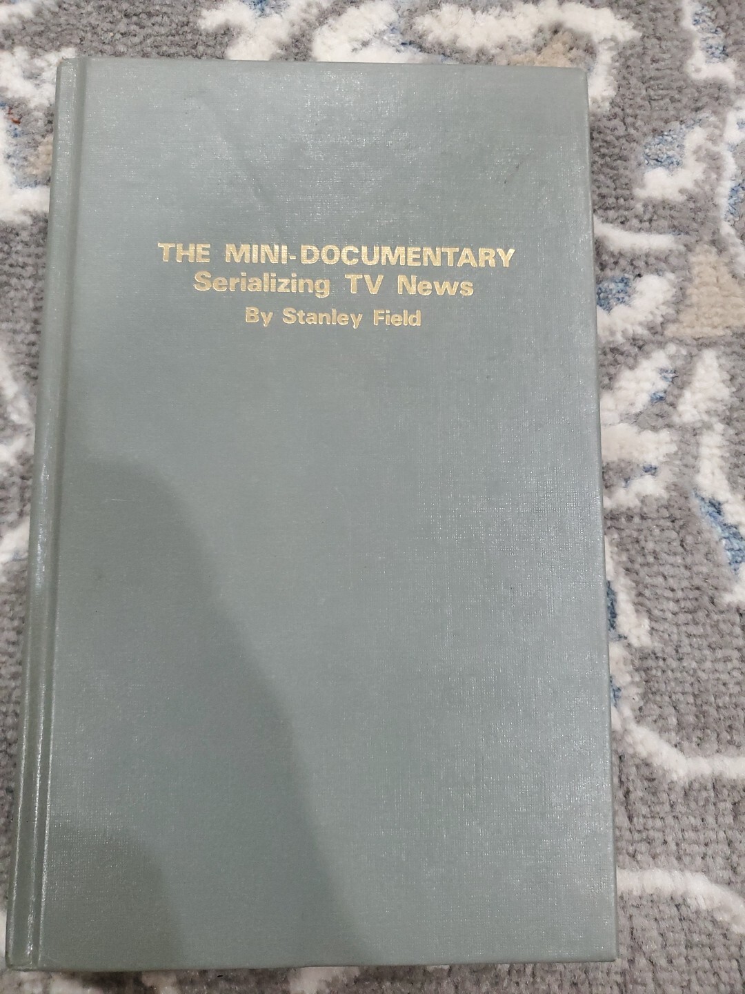 The mini-documentary: Serializing TV news Stanley Field hardcover Used – Very G