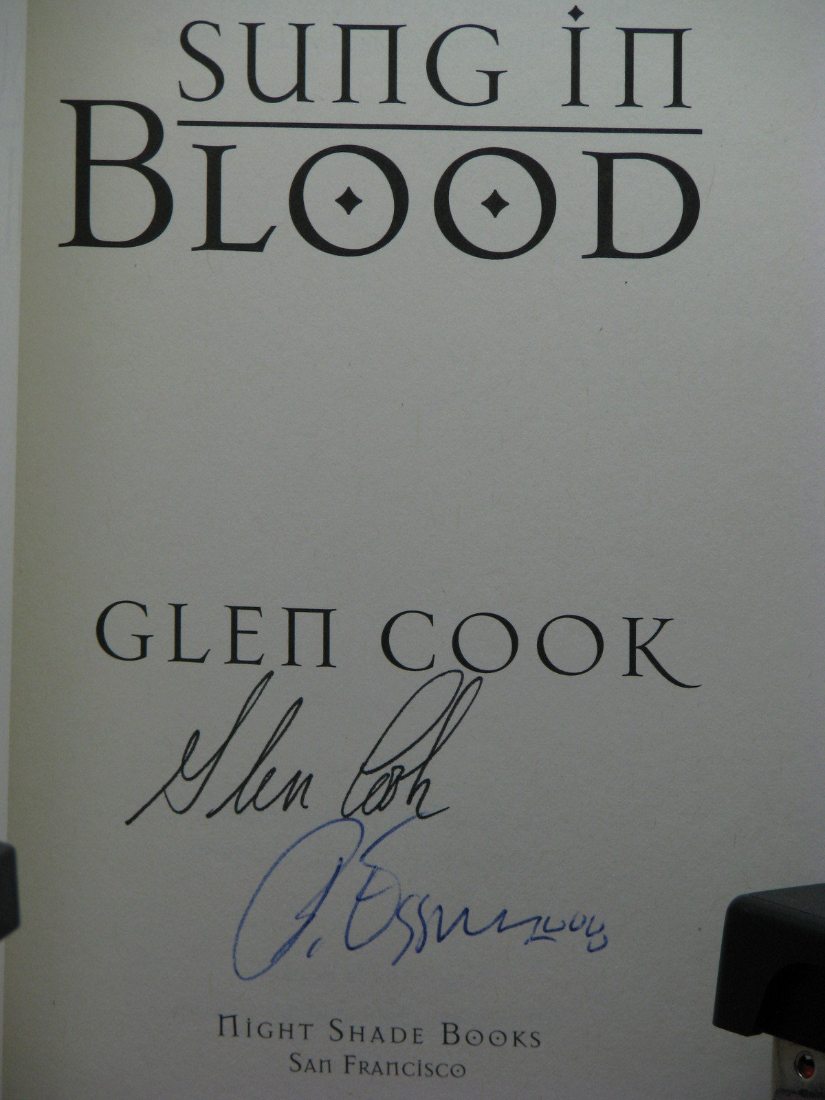 signed by 2(author,artist), Sung in Blood by Glen Cook (2006)art by Bob Eggleton