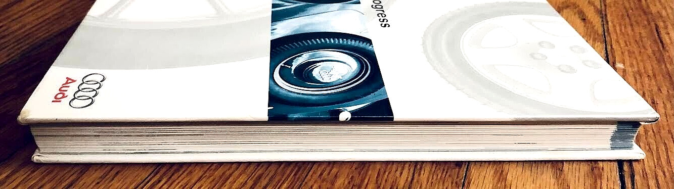 A HISTORY OF PROGRESS—CHRONICLE OF AUDI AG (1996) HARDCOVER—276 PAGES—EXCELLENT