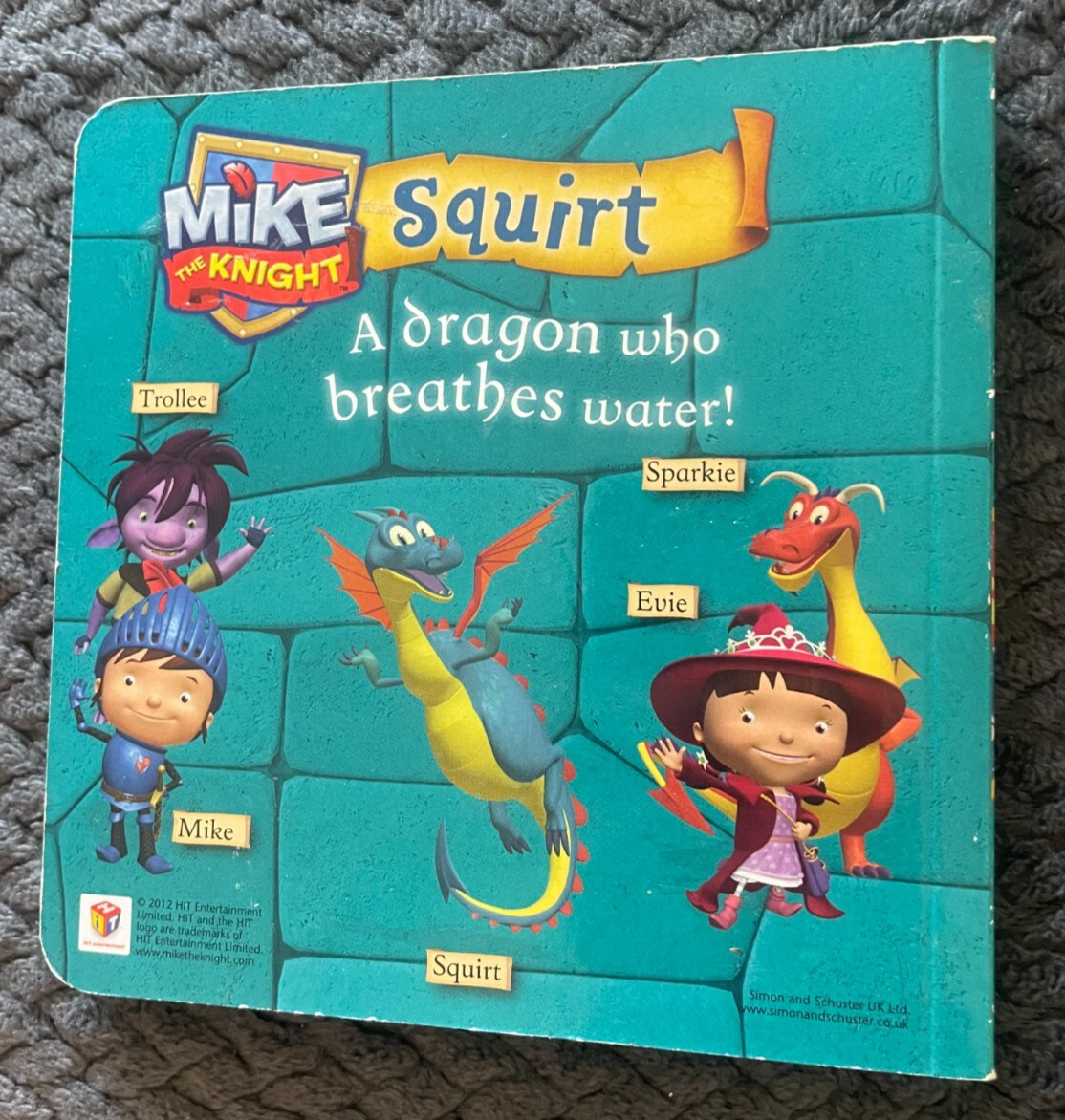 NEW. MIKE THE KNIGHT. SQUIRT. 14 BY 14CM. 2012 – BOARDED