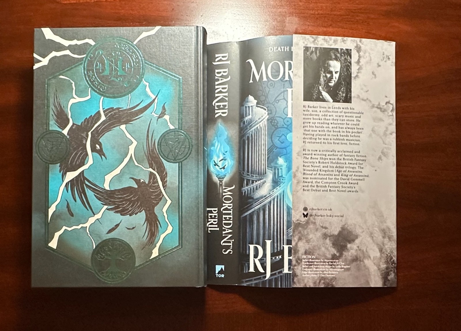 FairyLoot: Book of Fallen Leaves by AS Tamaki & Mortedant’s Peril by RJ Barker