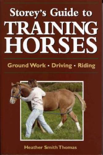 Storey’s Guide to Training Horses – Paperback – VERY GOOD