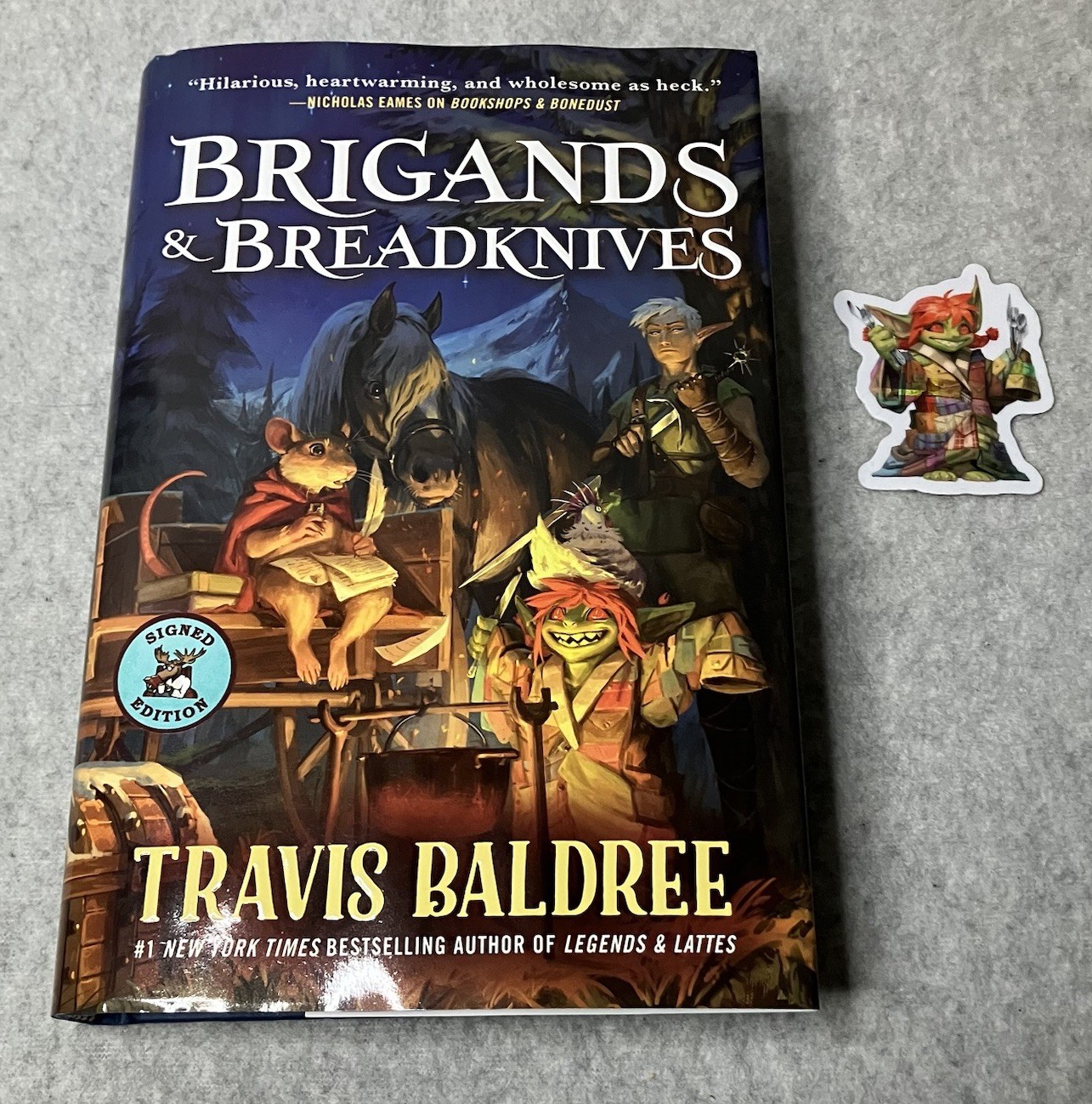 Brigands and Breadknives Travis Baldree 2025 Hardcover Signed 1st Ed w/Sticker
