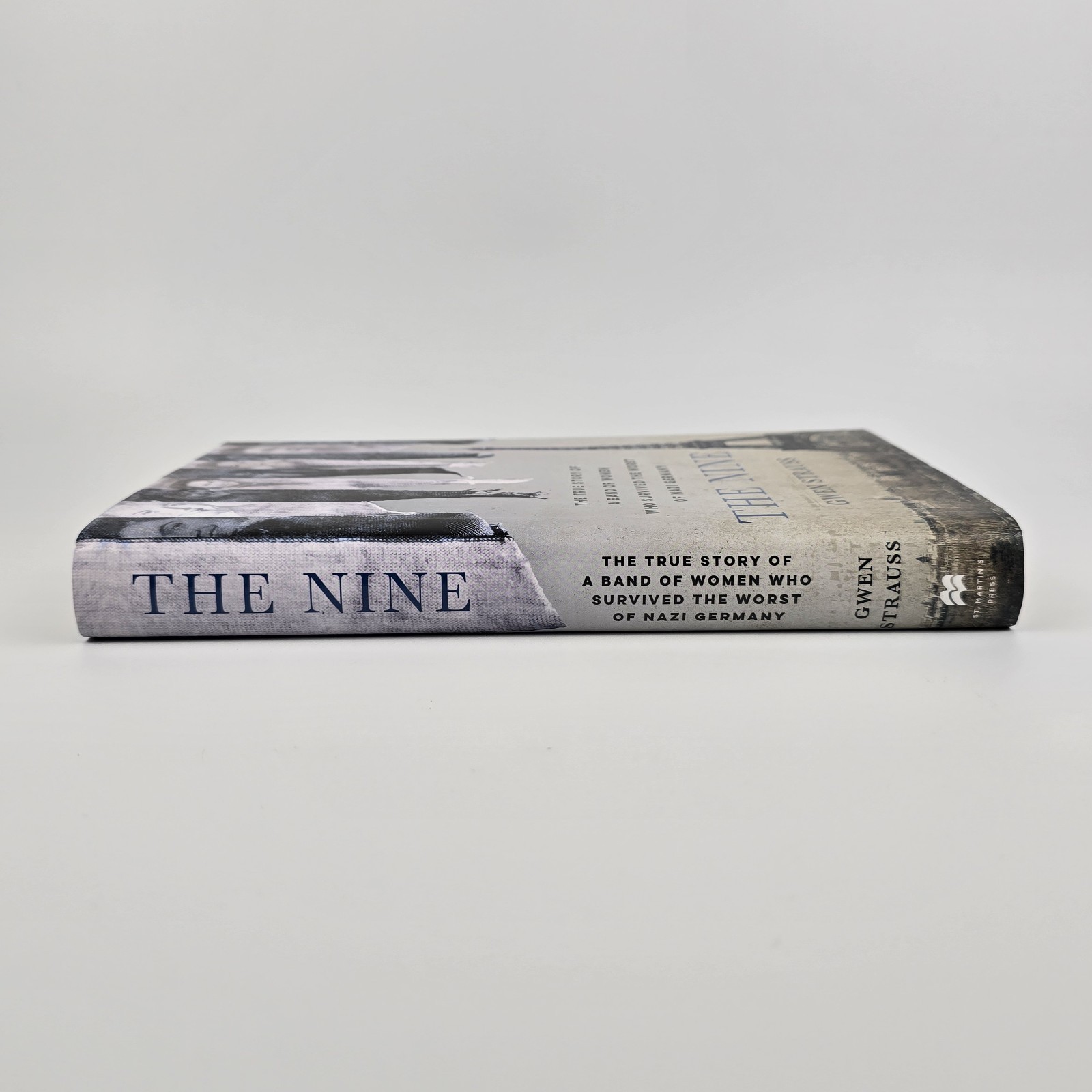 The Nine by Gwen Strauss Hardcover Book