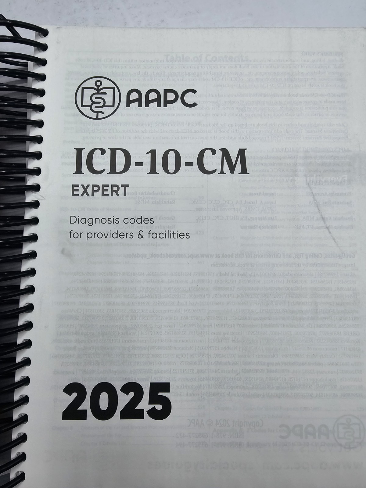 ICD-10-CM Expert Complete Code Set 2025 – Spiral-bound, by AAPC