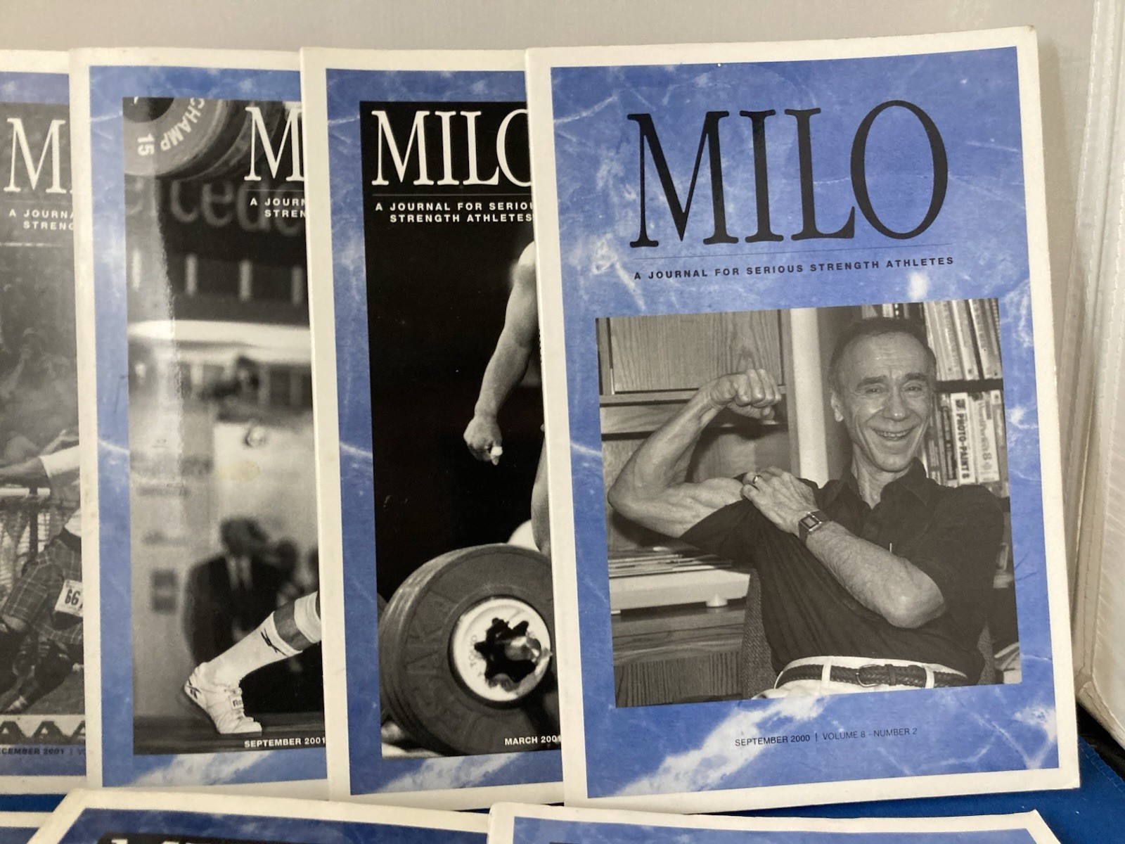 WEIGHTLIFTING-MILO JOURNALS FOR SERIOUS STRENGTH ATHLETES. LOT OF 7. 2000-2001