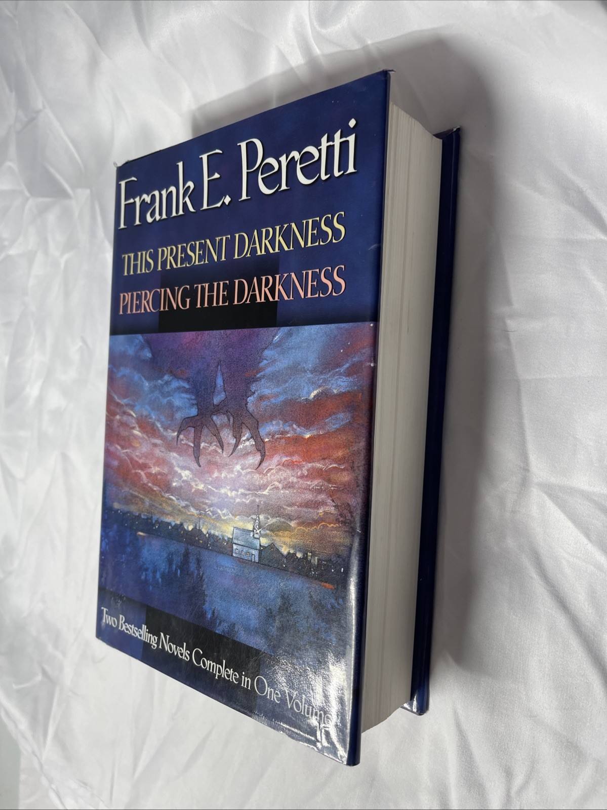 Frank Peretti 2-in-1: This Present Darkness & Piercing the Darkness Hardcover